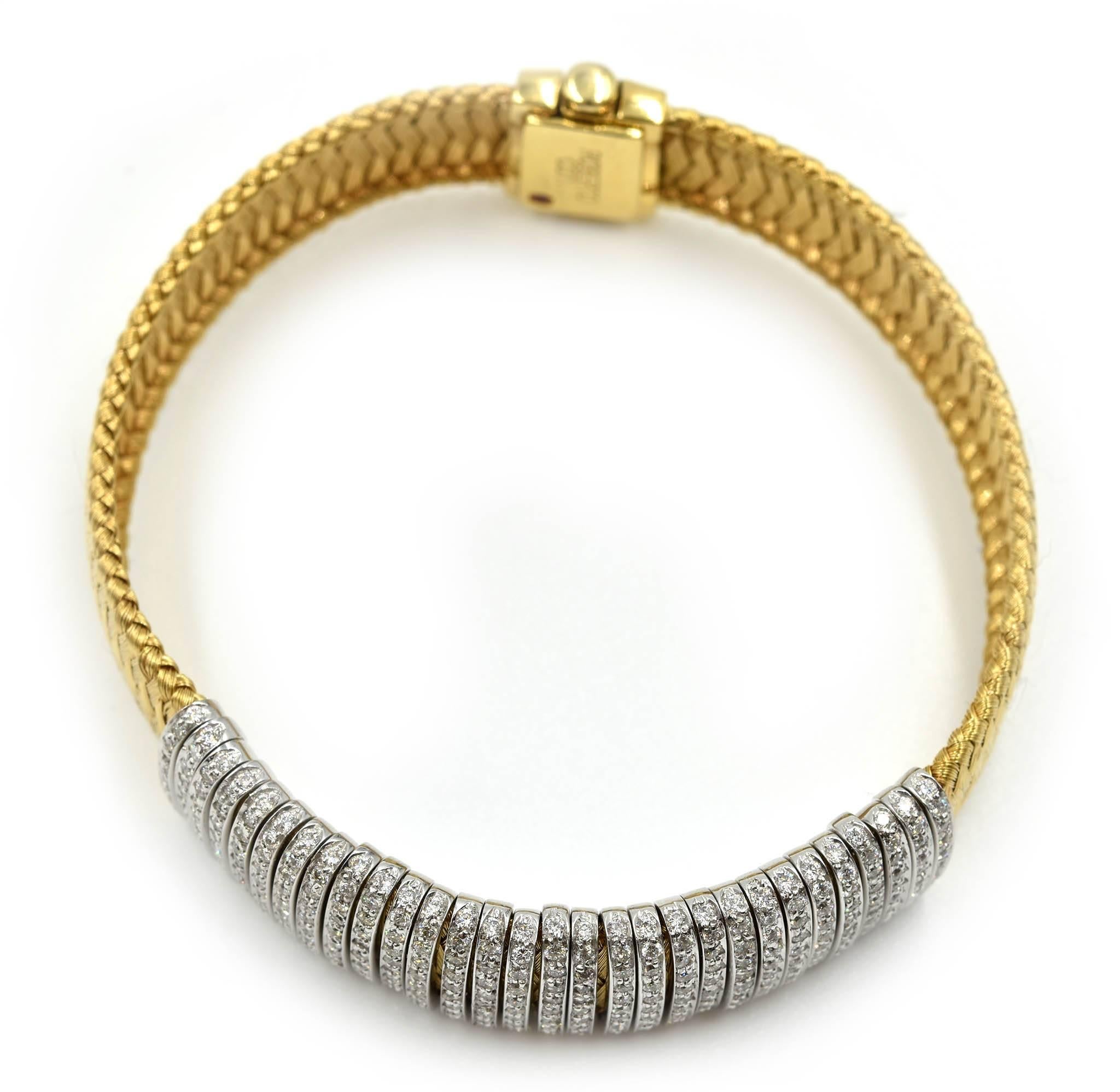 Designer: Roberto Coin
Collection: Primavera 
Material: 18k yellow gold
Diamonds: 330 round brilliant cuts = 1.65 carat total weight
Color: H-I
Clarity: VS
Dimensions: bracelet measures 6 inches long and a ½ inch wide
Weight: 33.65 grams
