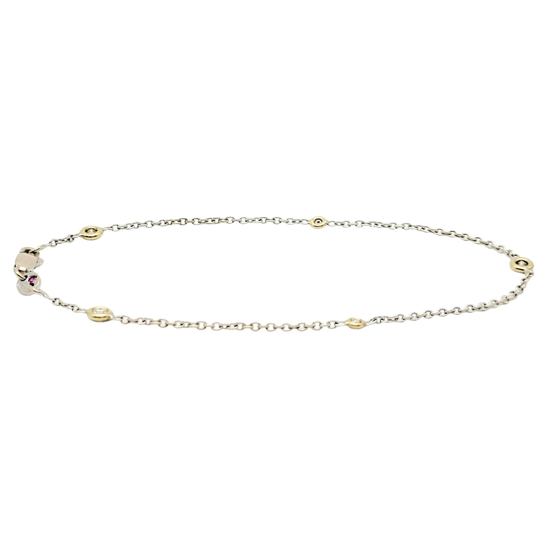 This Roberto Coin Diamond By the Inch station chain bracelet is a beautiful adornment for any jewelry collection. This delicately designed piece features a dainty cable chain crafted in white gold, exuding a refined and timeless allure. The