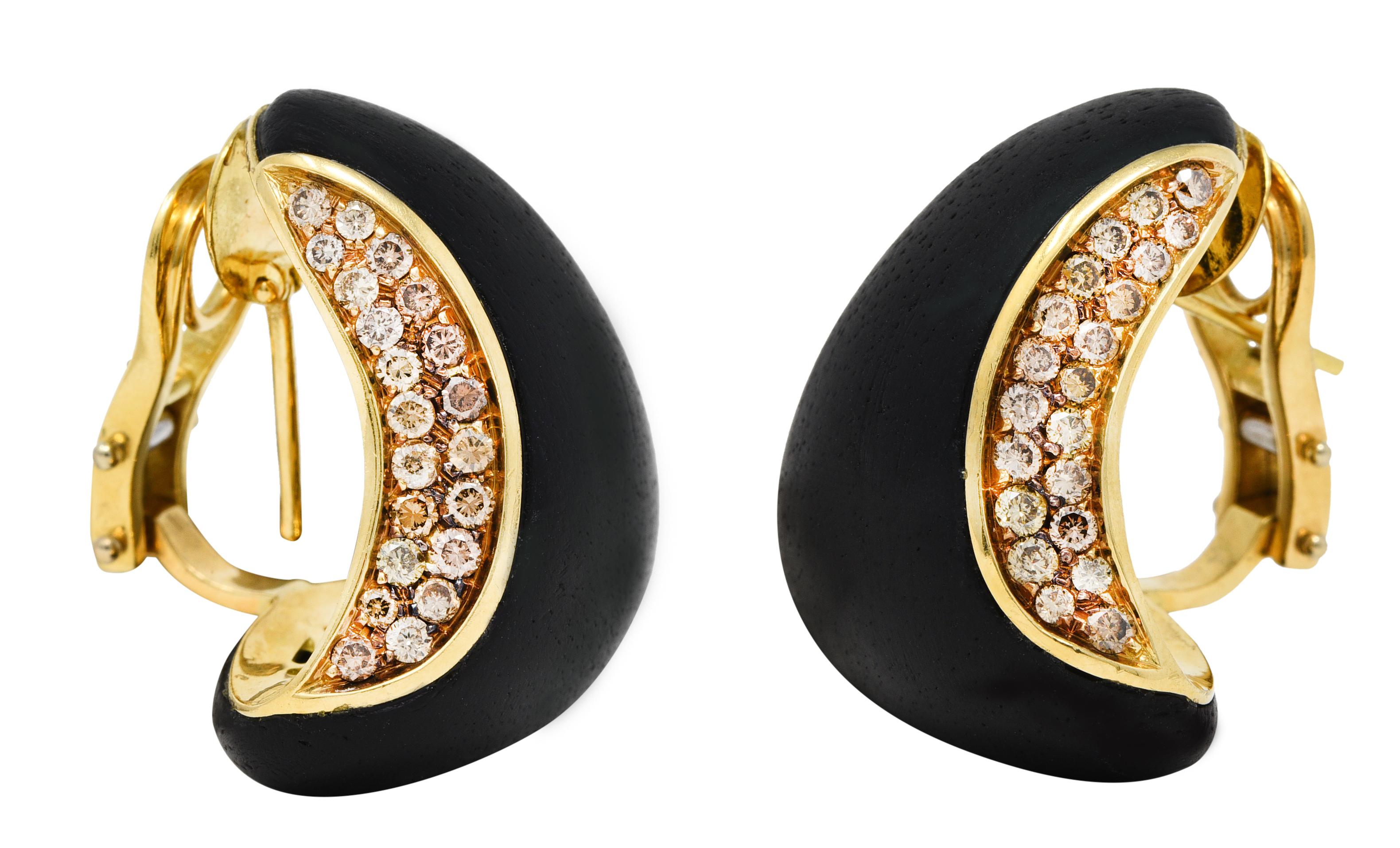 J hoop style earrings feature carved ebony wood - opaque and a porous matte black

Pavè set to one side by fancy brown colored round brilliant cut diamonds

Weighing in total approximately 1.05 carat - fancy light to fancy in color with SI
