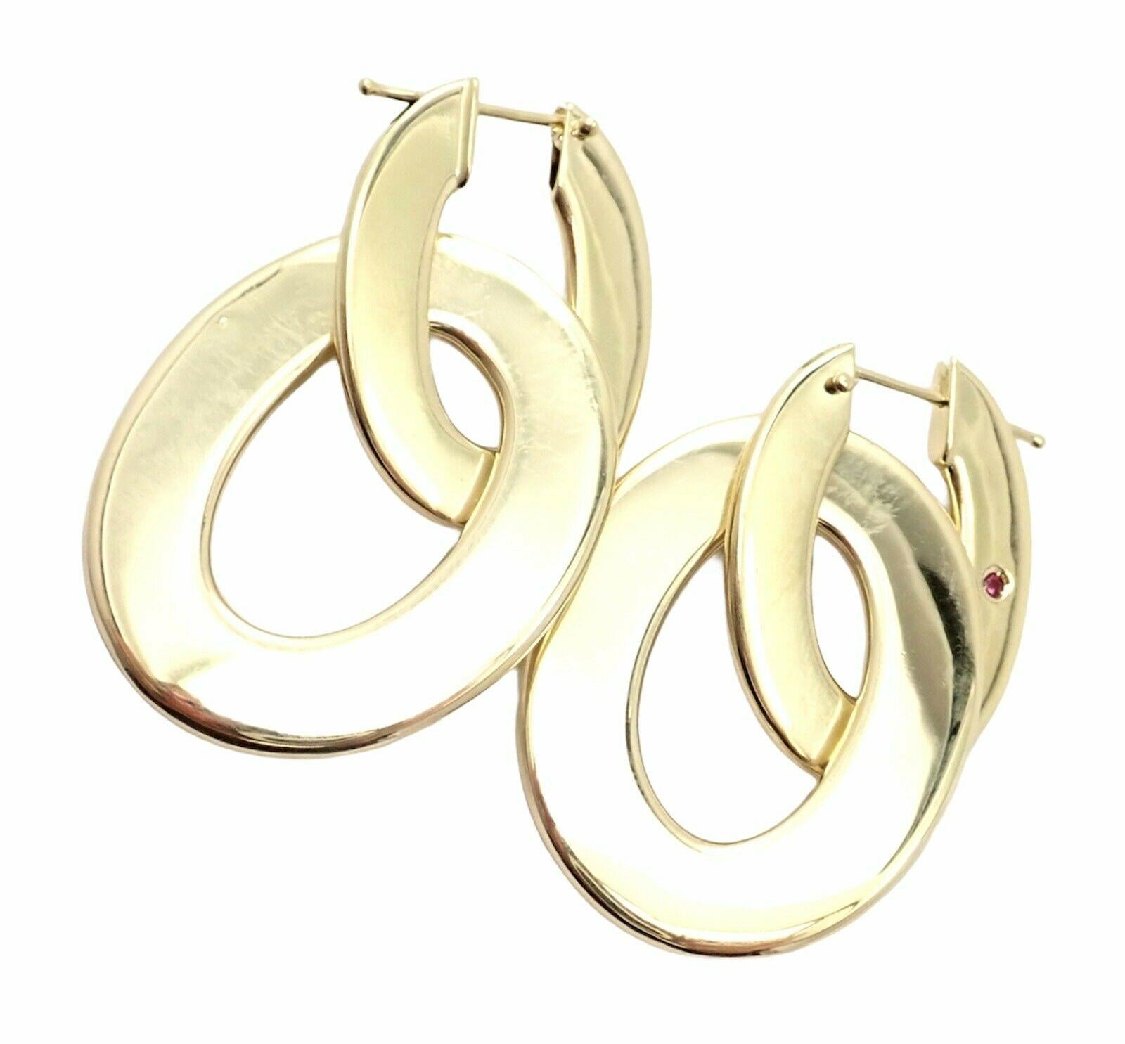 18k Yellow Gold Extra Large Link Chic And Shine Earrings by Roberto Coin. 
With round ruby
Details: 
Measurements: 27mm x 48mm
Weight: 16.3 grams
Stamped Hallmarks: Roberto Coin 750 Italy 1226VI 2xRuby 
*Free Shipping within the United States*
YOUR