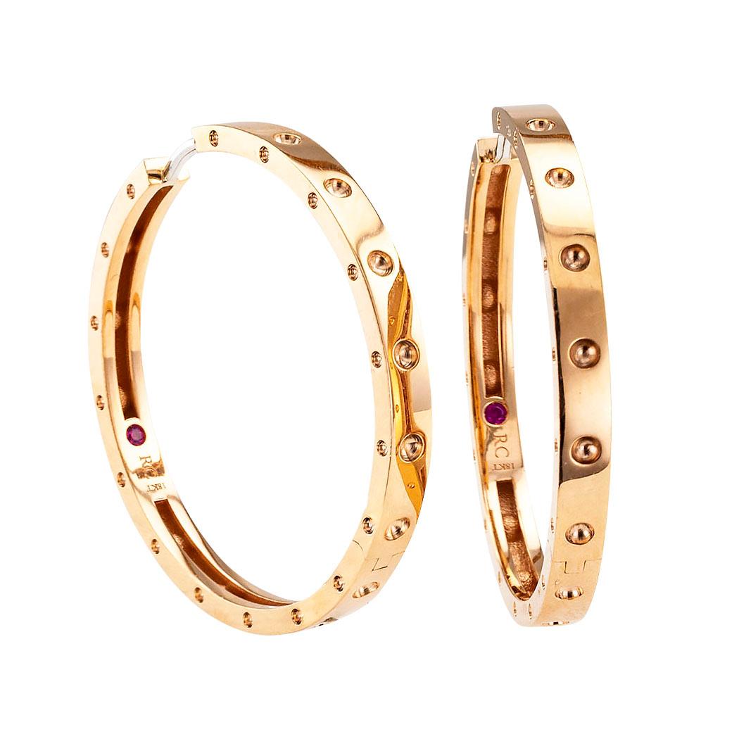 Roberto Coin extra-large pink gold hoop earrings.

DETAILS:
METAL:  18-karat pink gold.
HALLMARKS:  maker’s marks for Roberto Coin. 
MEASUREMENTS:  3 mm wide and 33 mm diameter.
WEIGHT:  9.6 grams.
CONDITION:  high magnification photographs show