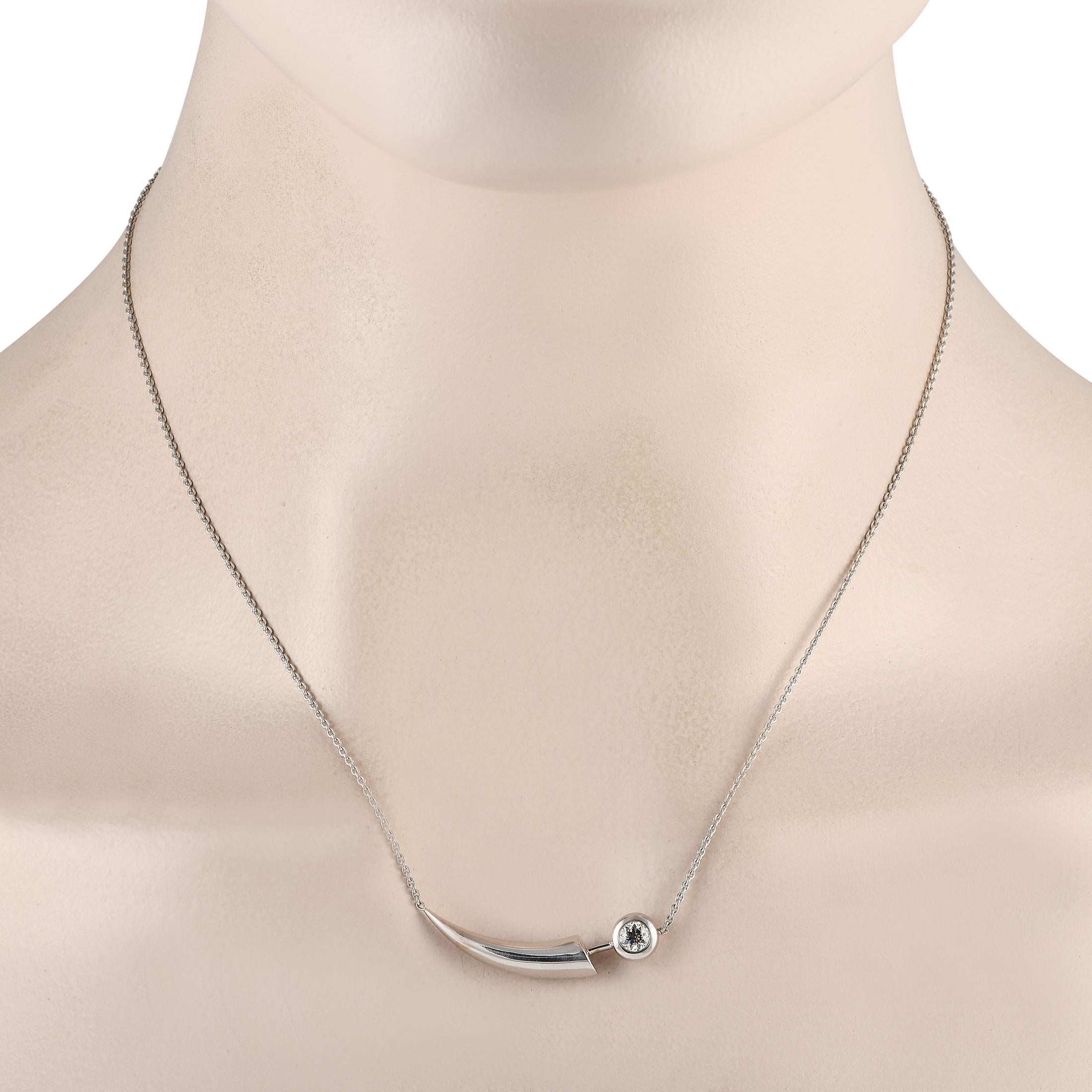 This Roberto Coin Fang necklace is an elegant, understated accessory that is ideal for any occasion. At the center of this pieces 16 chain, an 18K White Gold pendant measuring 0.50 long by 1.25 wide comes to life thanks to its sleek shape and a 0.30