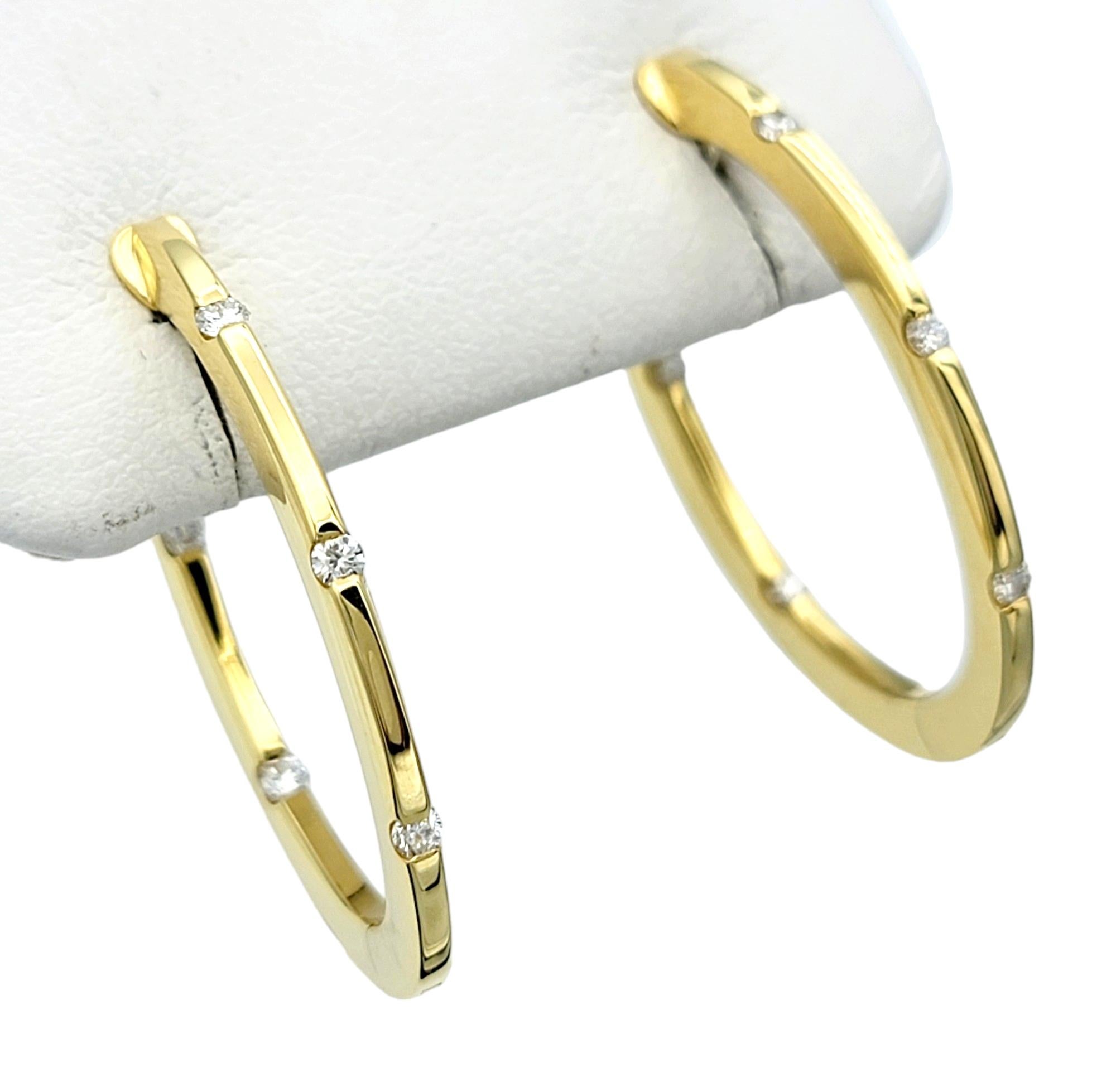 Contemporary Roberto Coin Flat Oval Hoop Earrings with Diamonds Set in 18 Karat Yellow Gold