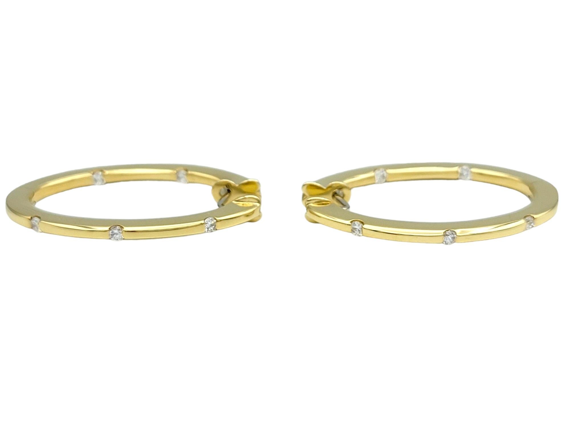 Roberto Coin Flat Oval Hoop Earrings with Diamonds Set in 18 Karat Yellow Gold 1