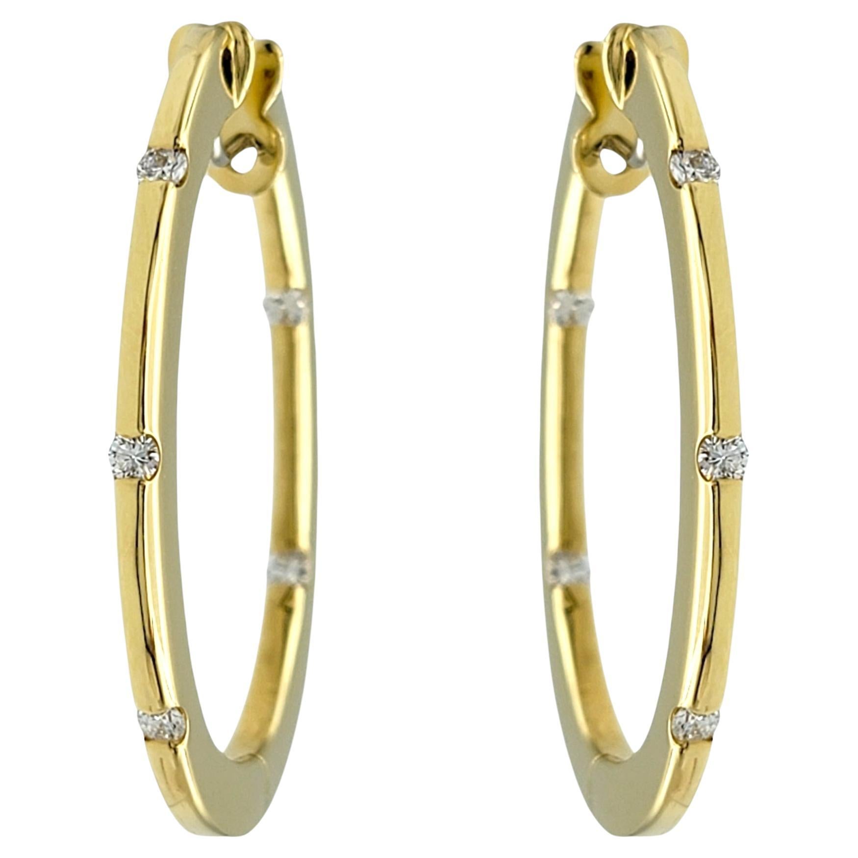 Roberto Coin Flat Oval Hoop Earrings with Diamonds Set in 18 Karat Yellow Gold