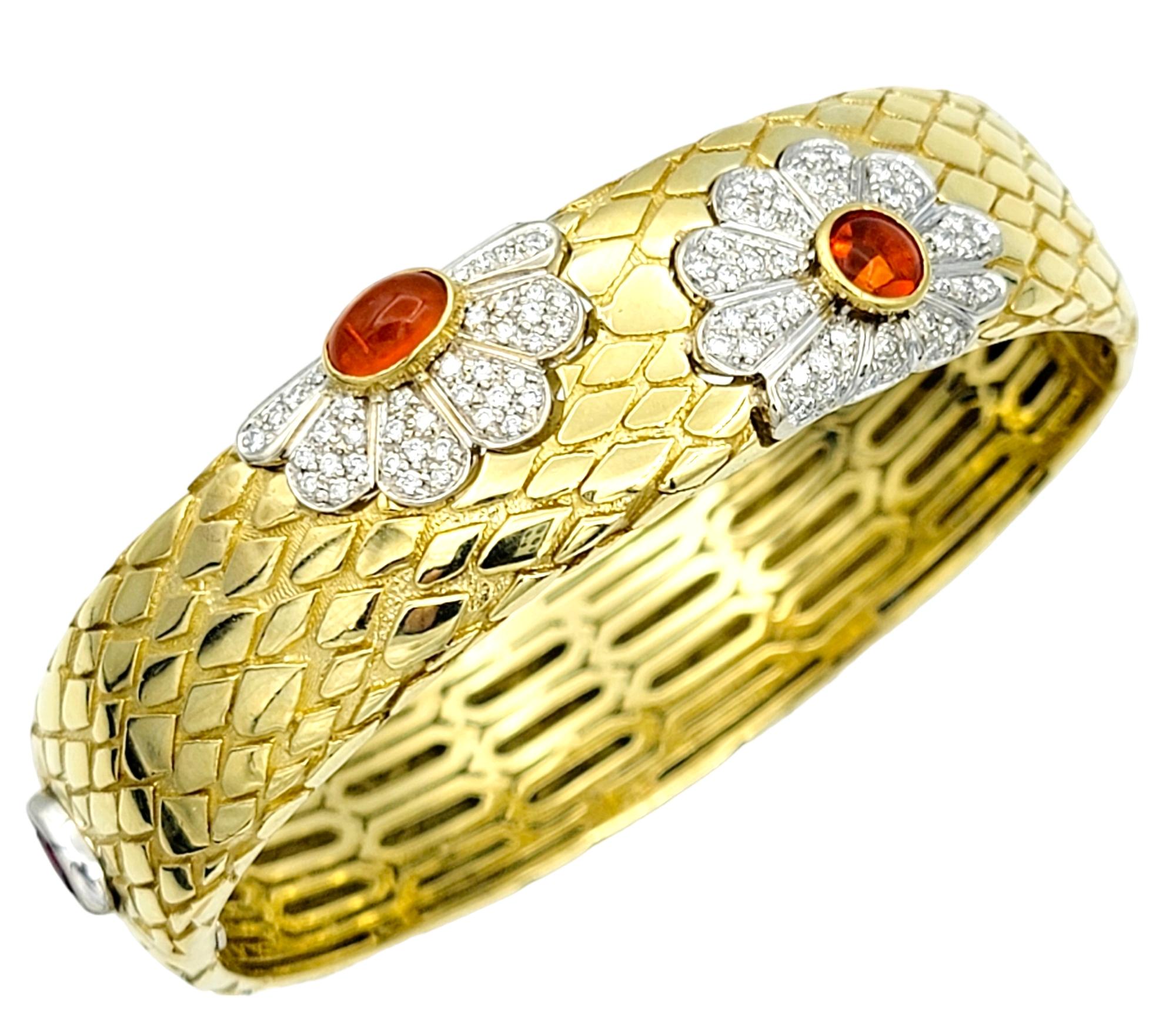 This gorgeous and unique piece from Roberto Coin is an absolute work of art that embodies luxury, sophistication, and timeless beauty. Bold in both design and style, this amazing designer bracelet is sure to turn heads. 

This incredible hinged