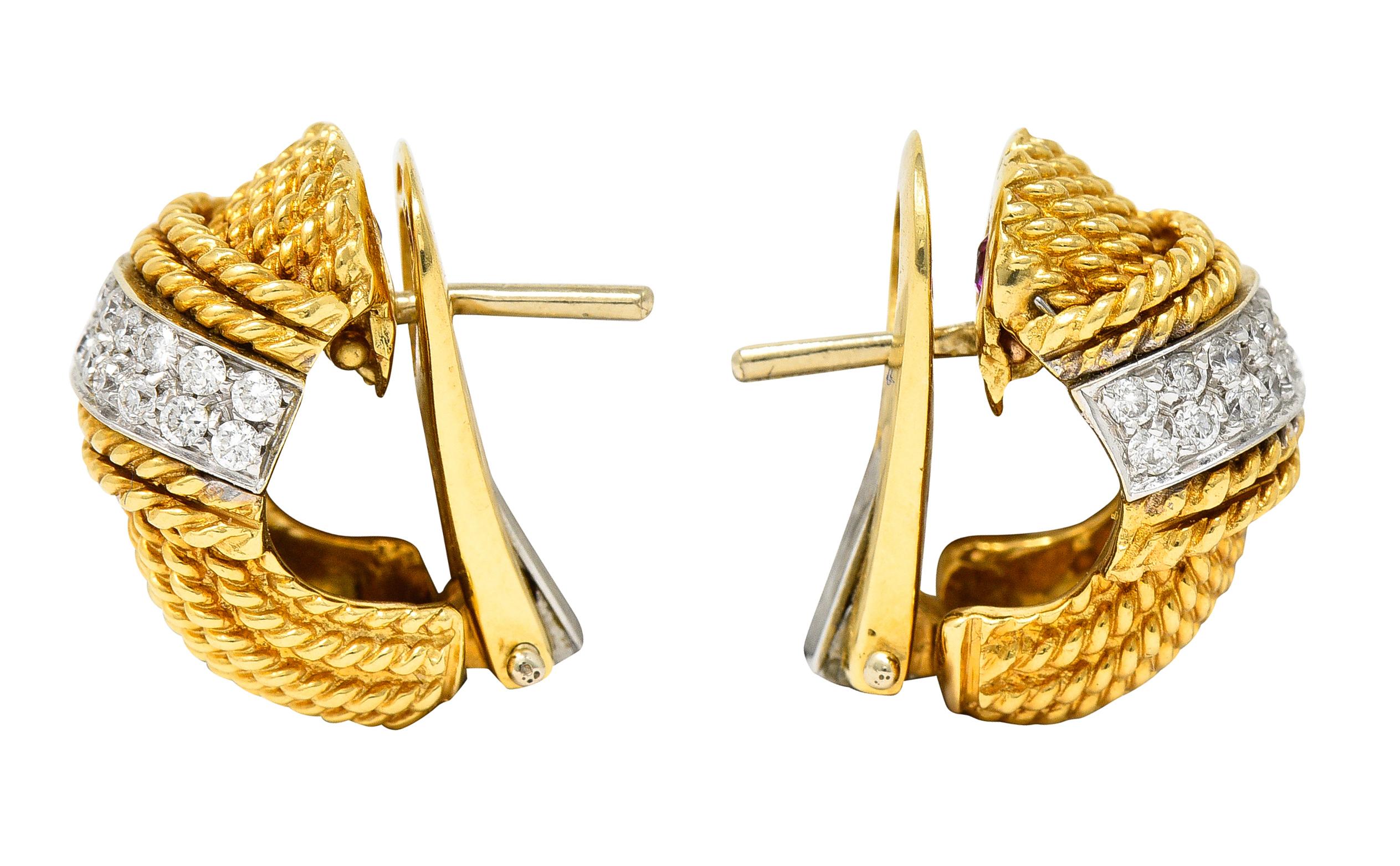 Yellow gold J hoop earrings are comprised of segments of twisted rope motif

With a white gold band oriented East to West - pavè set with round brilliant cut diamonds

Weighing in total approximately 0.75 carat - G/H color with SI clarity

Completed