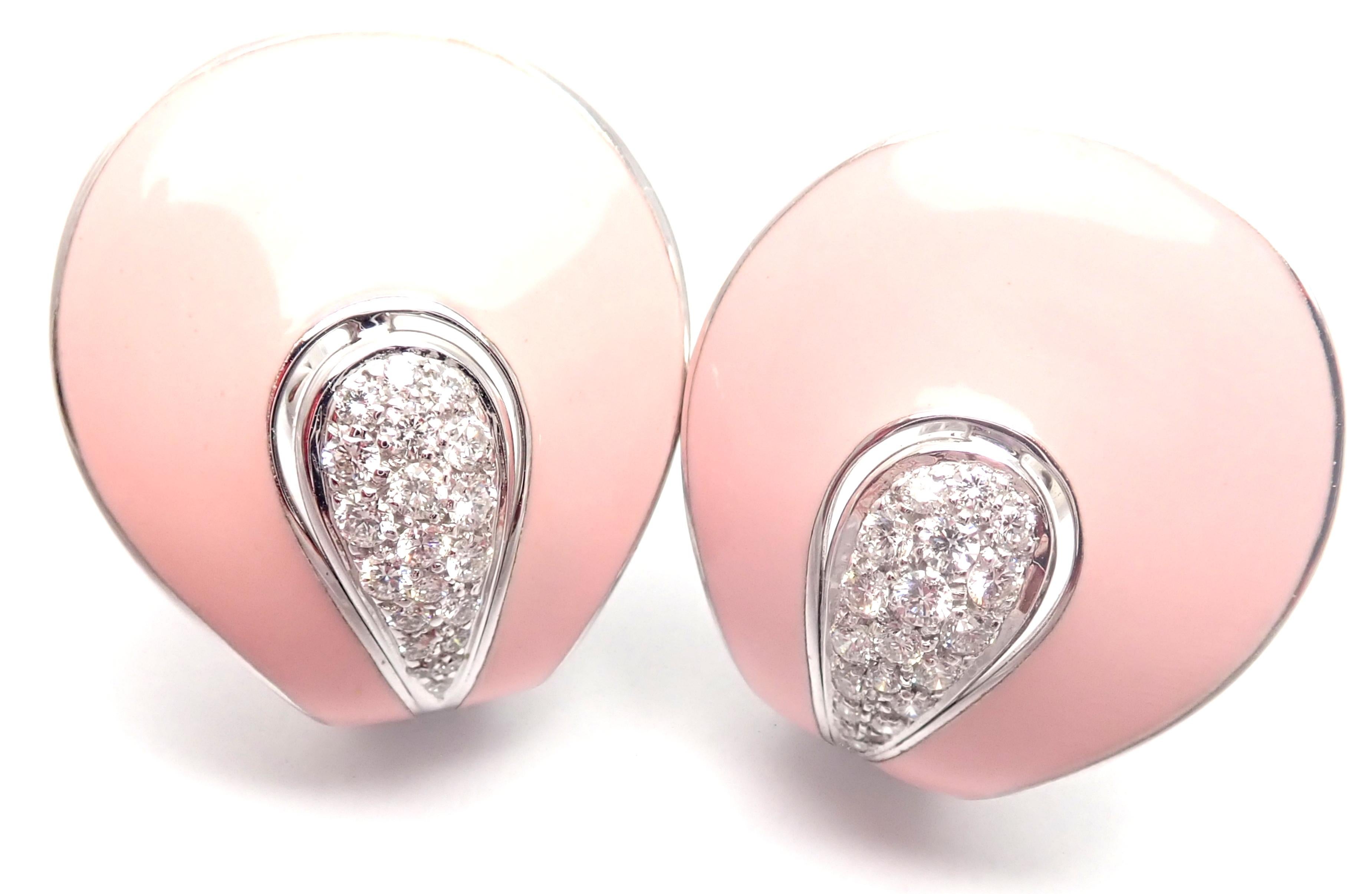 18k White Gold Pink Enamel Diamond Liberty Earrings by Roberto Coin.
These earrings have collapsable posts so that they can be used for pierced ears and as clips.
With Round diamonds VS1 clarity, G color total weight approximately .55ct
Rose