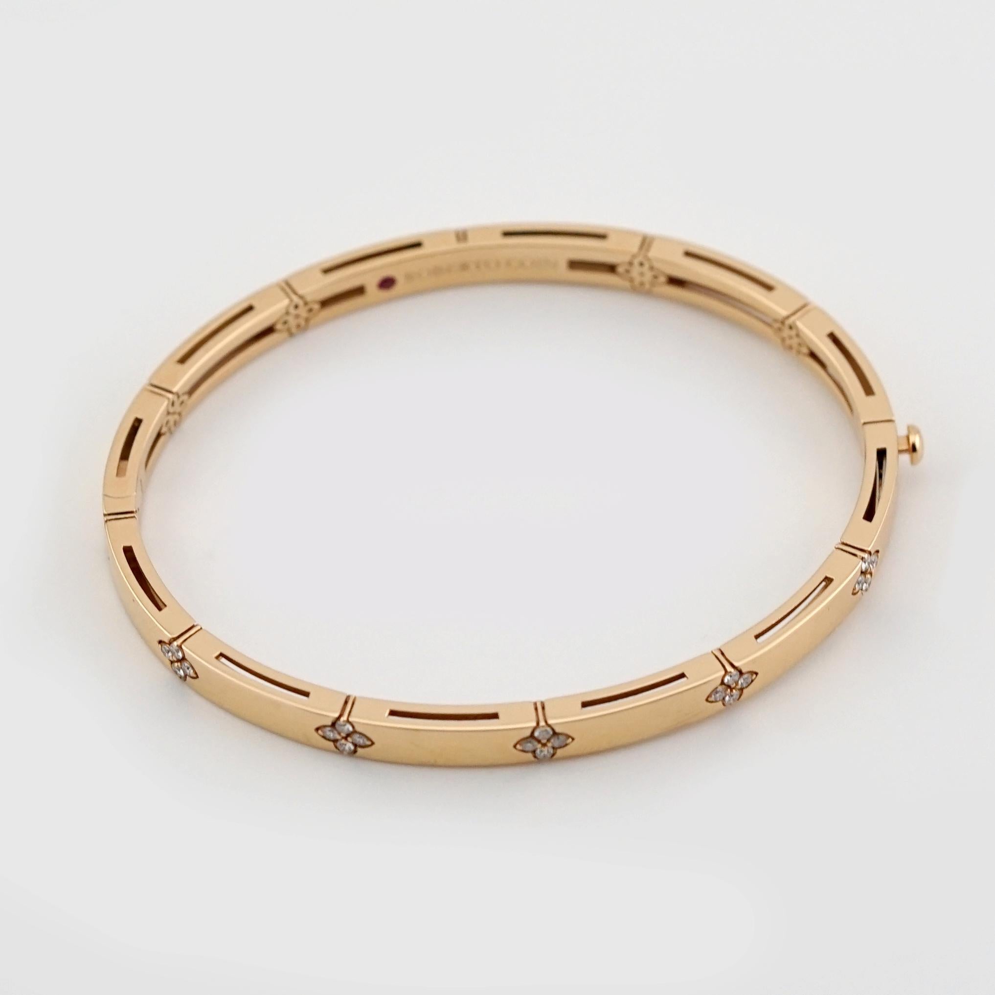 This exquisite bangle from Roberto Coin's iconic Love in Verona collection is crafted in radiant 18K yellow gold. 

Featuring a delicate floral motif engraved around the bracelet, it embodies timeless elegance with a modern touch. 

The signature