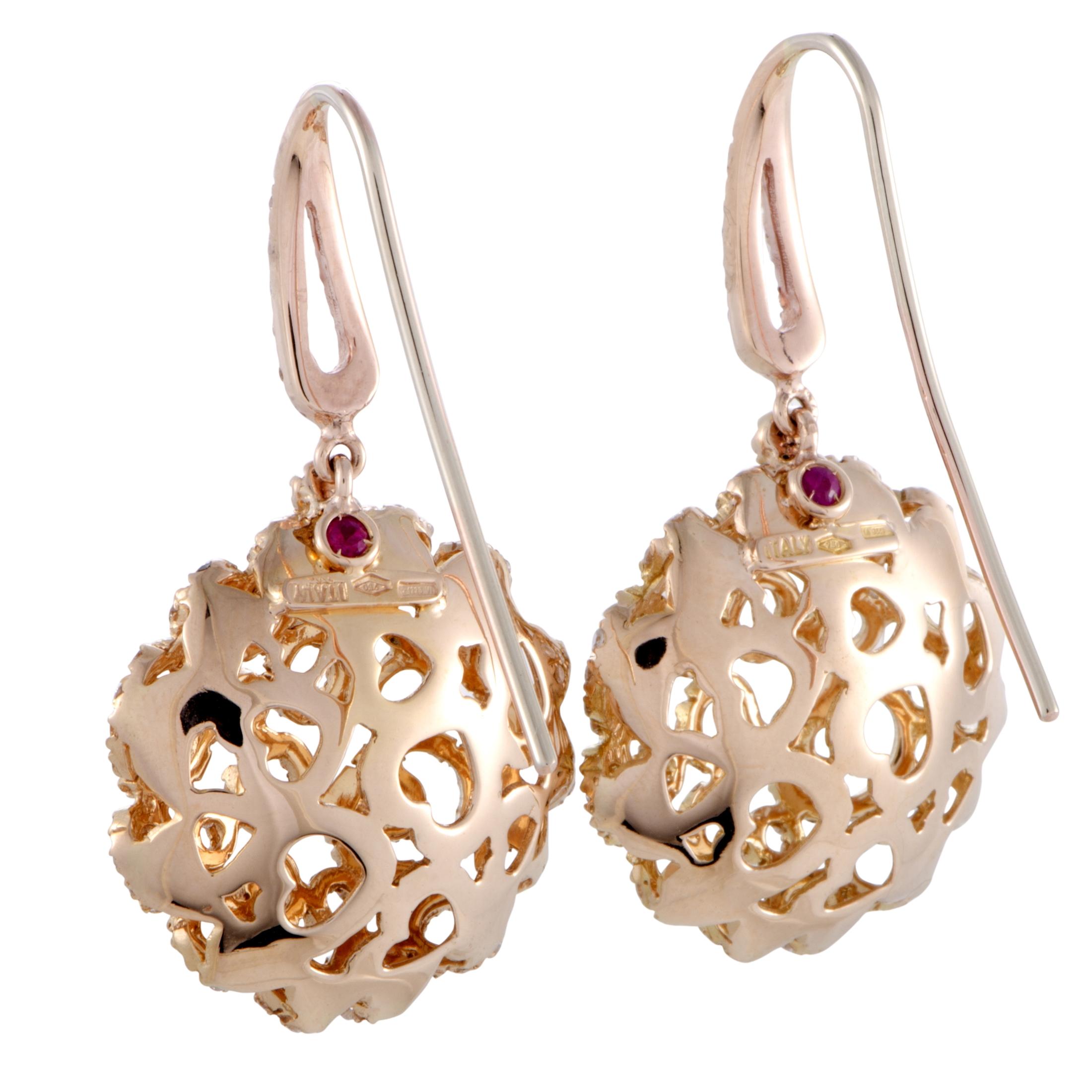 A fascinating show of fabulous radiance and lustrous exuberance, this majestic pair of earrings from Roberto Coin offers eye-catching visual presence while achieving a remarkably tasteful overall tone in the classically stylish combination of