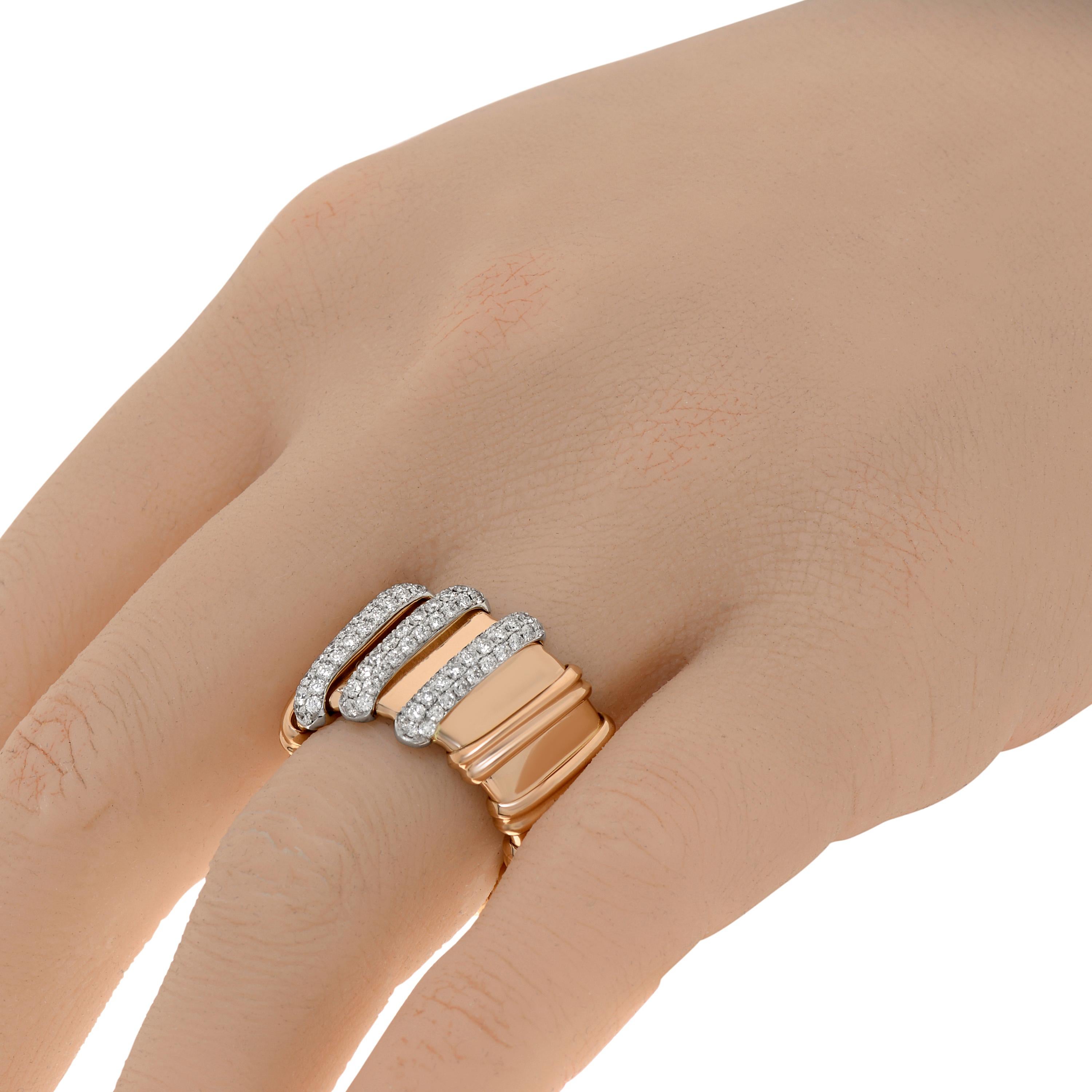 This classic Roberto Coin 18k rose gold band ring features 0.85ct tw diamonds. The band is flexible and sized at 5.75. The band's width is 15mm. The total weight is 16.0g. This designer jewelry is shipped with a Roberto Coin Pouch.
