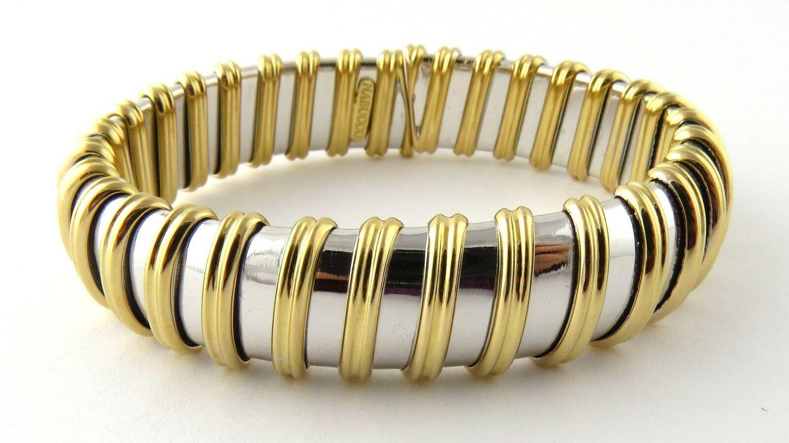 Roberto Coin Nabucco 18K White and Yellow Gold Bangle Bracelet

This authentic Roberto Coin Nabucco bracelet is stamped Nabucco 18K *1226VI Italy

This bracelet is approx. 6.5 