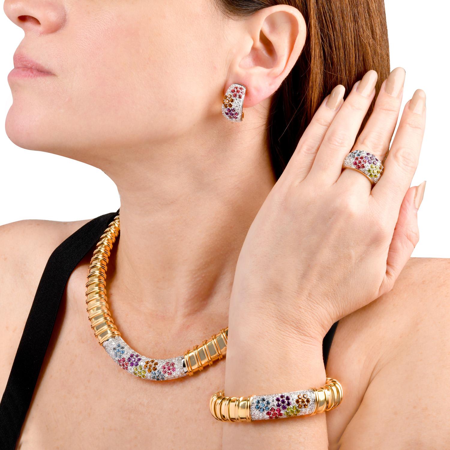 atement Suite of Four from Nabucco Collection.

Presenting a beautiful statement Necklace, Bracelet, Earrings, and ring. All are forged in 18K Yellow gold from the house of Roberto Coin Jewelry. These Grooved textured pieces are set with natural