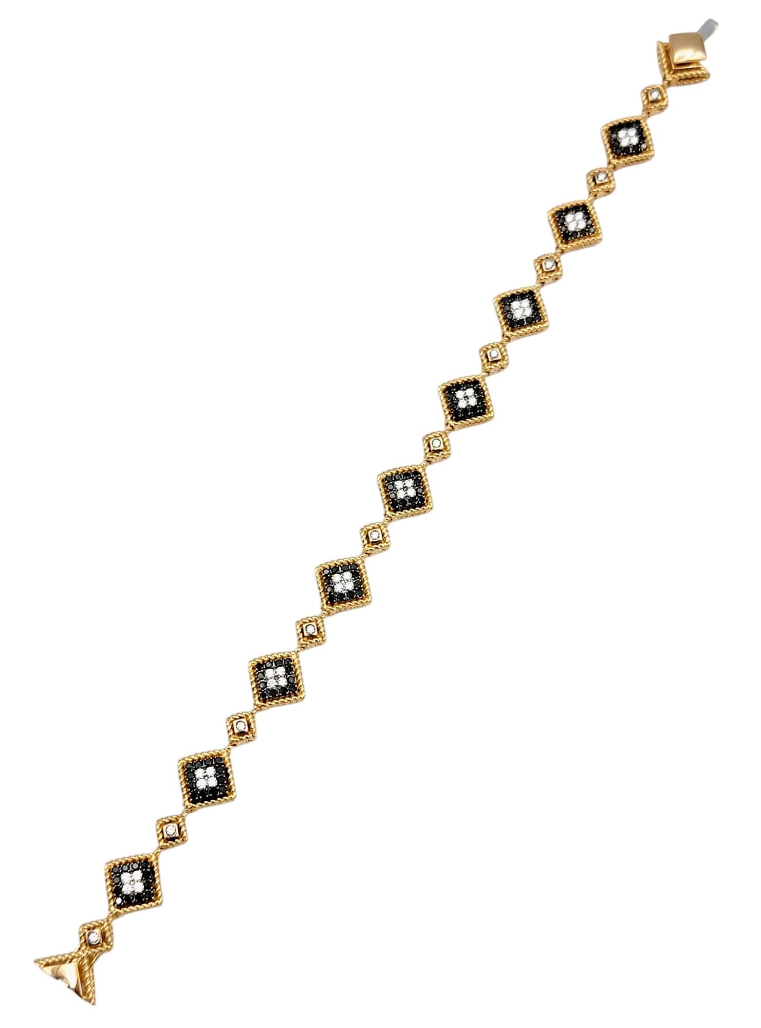 The Roberto Coin Palazzo Ducale black and white diamond bracelet is a masterpiece of modern elegance and timeless design. Crafted in 18 karat rose gold, this bracelet exudes a warm, luxurious glow that perfectly complements the intricate pattern