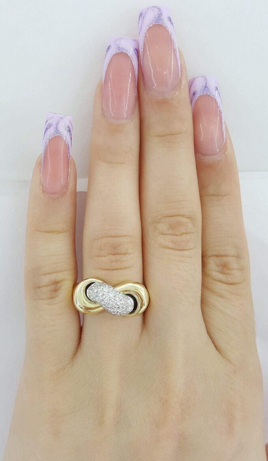 Roberto Coin Bague nœud d'infini en or jaune 18 carats sertie de diamants pavés Pour hommes en vente