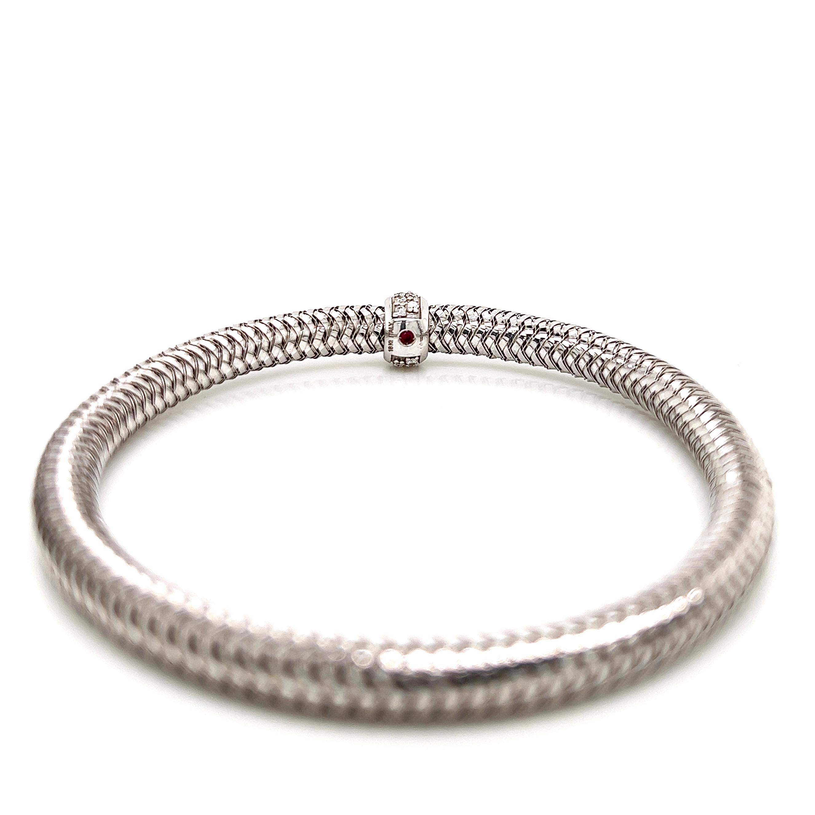 Roberto Coin 18K White Gold Primavera Diamond Station Flexible Bracelet.
Size is adjustable up to 7.25 inches
Approx. .22 total carat weight of natural Diamonds