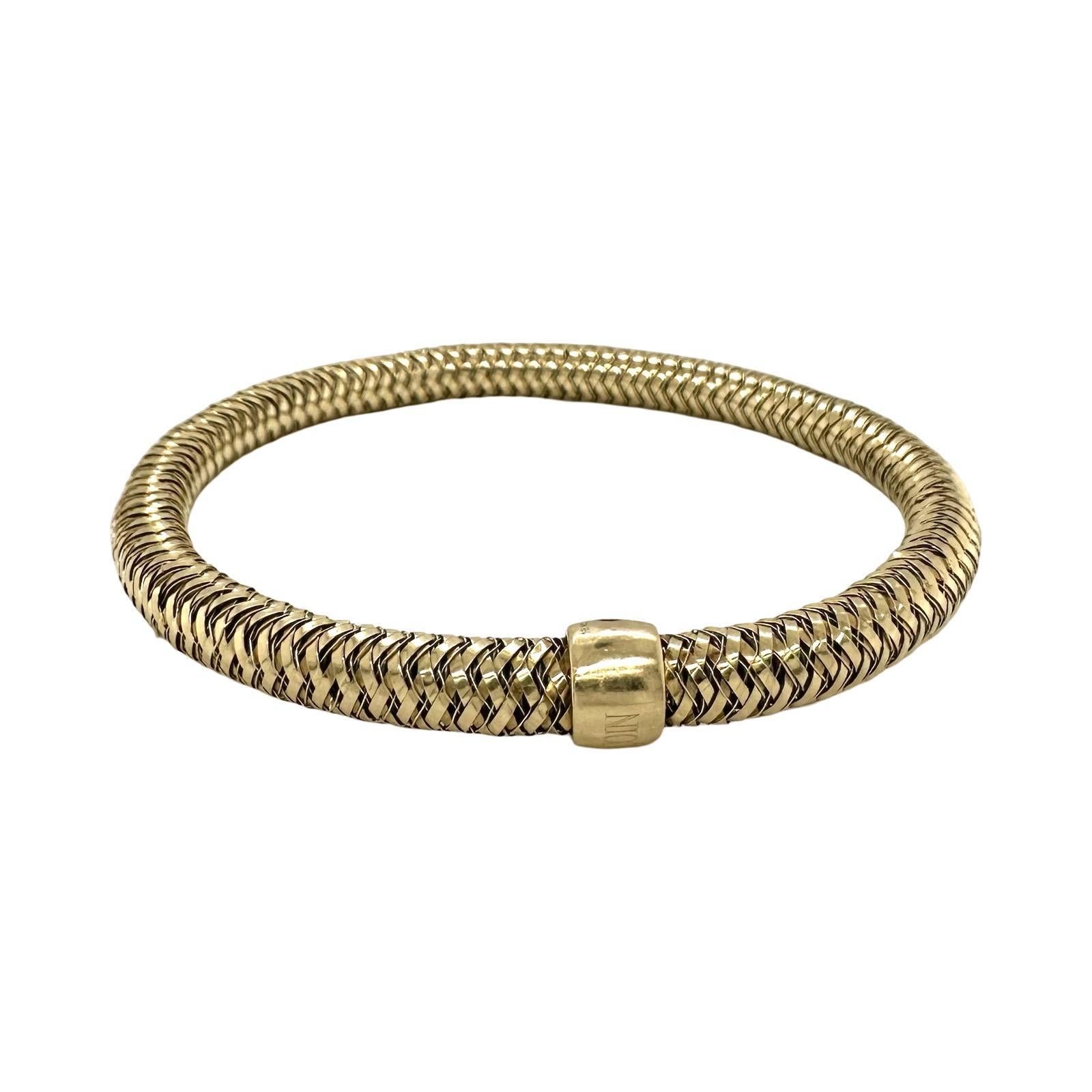 Brand: Roberto Coin
Collection: Primavera 
Style: Flexible Bracelet
Material: Yellow Gold
Metal Purity: 18k
Stones: 1 Ruby (signature RC)
Total Item Weight (grams): 13
Bracelet Size: fits a wrist up to 6.75 inches
Includes: Brilliance Jewels