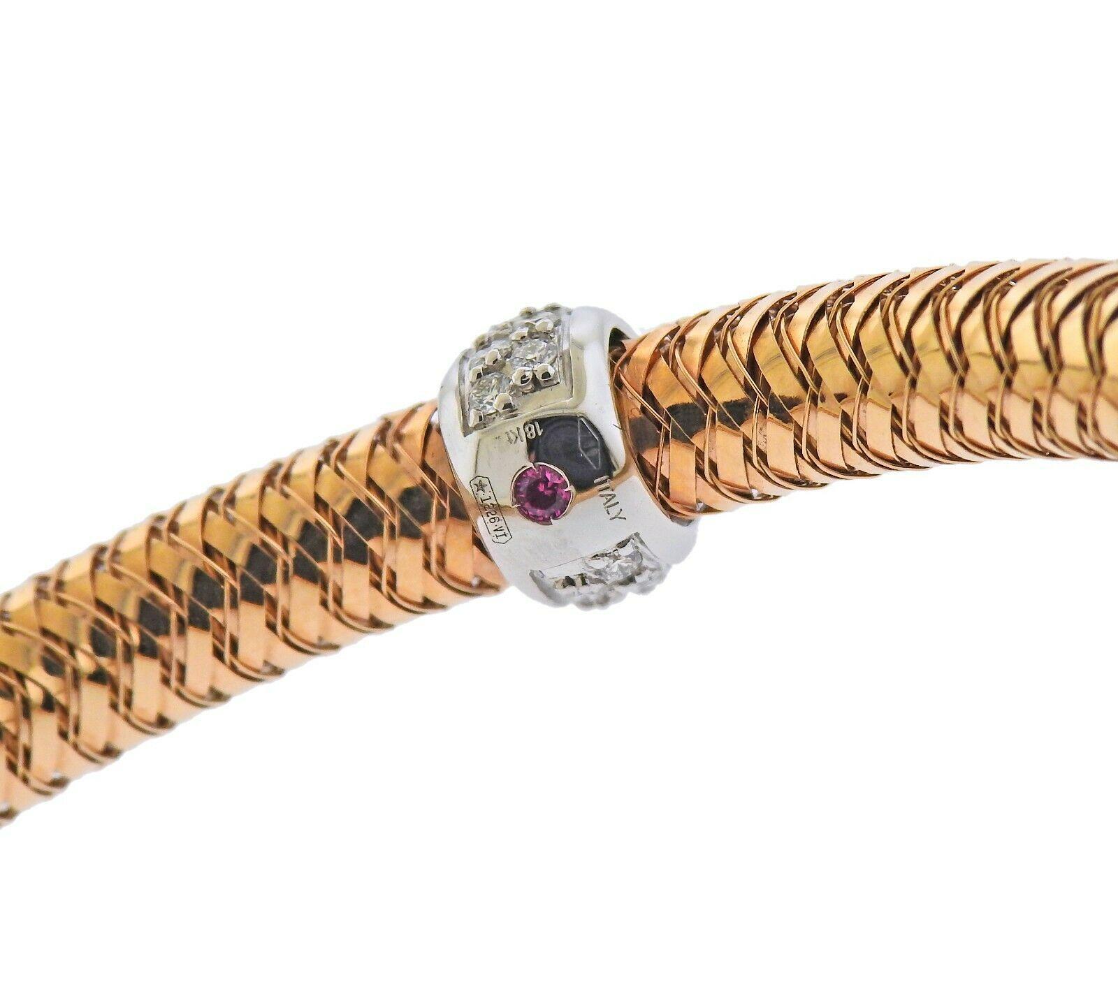 New 18k rose and white gold Primavera flexible bracelet by Roberto Coin, with approx.0.22ctw in G/VS diamonds. Retail $2300, comes with box. Bracelet will fit approx. 7