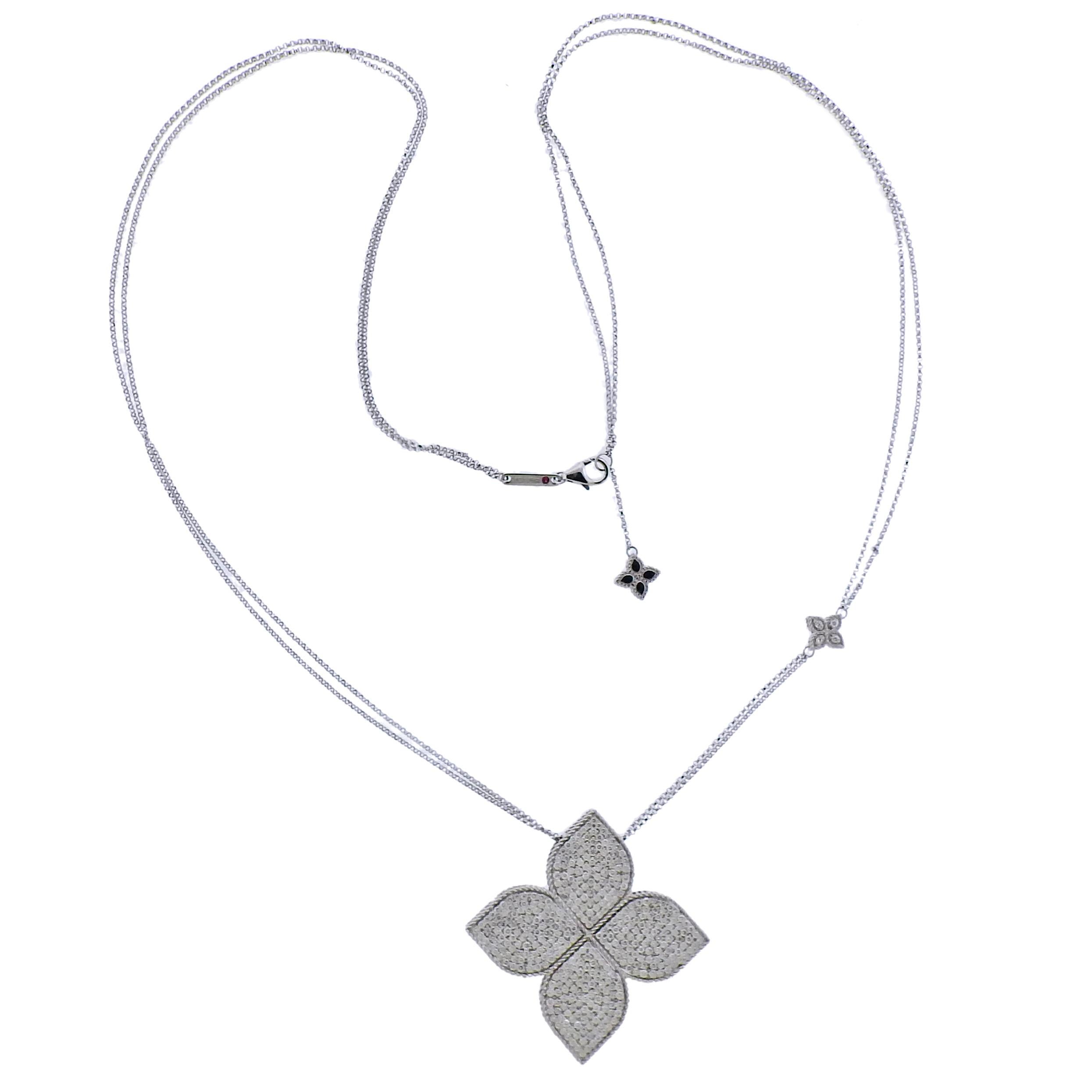 Gorgeous 18k white gold Princess Flower necklace by Robert  Coin, featuring long double chain and pendant with approx. 4.28ctw in G/VS diamonds. Approx. retail $25000, comes with box. Necklace is 26