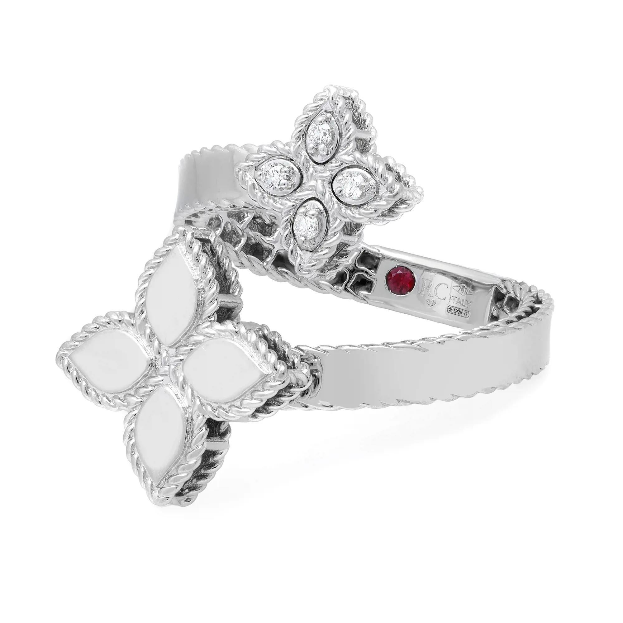 This beautiful Roberto Coin princess flower ring is crafted in fine 18K white gold. Adorned with four shimmering round brilliant cut diamonds with a hidden internal round cut ruby. Total diamond weight: 0.05 carat. Ring size: 6. Total weight: 5.11