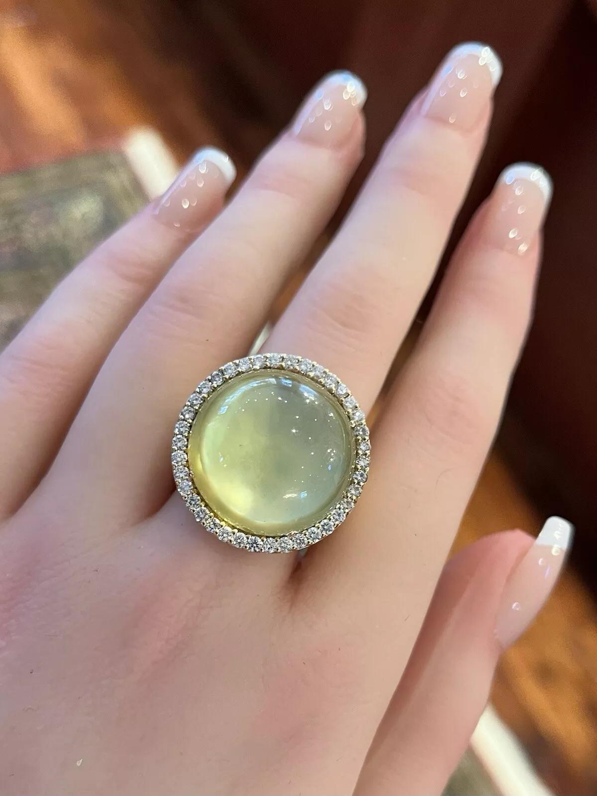 Roberto Coin Quartz, Pearl and Diamond Bubble Ring in 18k Rose Gold

Diamond and Quartz Bubble Ring features a Round Cabochon of Yellow Quartz set over Mother of Pearl and surrounded by Round Brilliant Diamonds, all set in a high polished 18k Rose