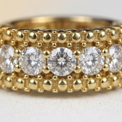 Orecchini a cerchio "Huggie" Roberto Coin Siena in oro giallo 18k con diamanti