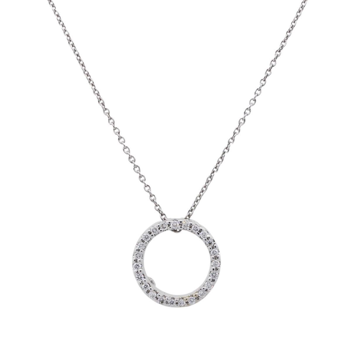 Designer: Roberto Coin
Material: 18k white gold
Diamond Details: Approximately 0.12ctw of round brilliant diamonds. Diamonds are F/G in color, VS in clarity
Necklace Measurements: Necklace measures 16″
Pendant Measurements: Pendant measures 0.46″ x