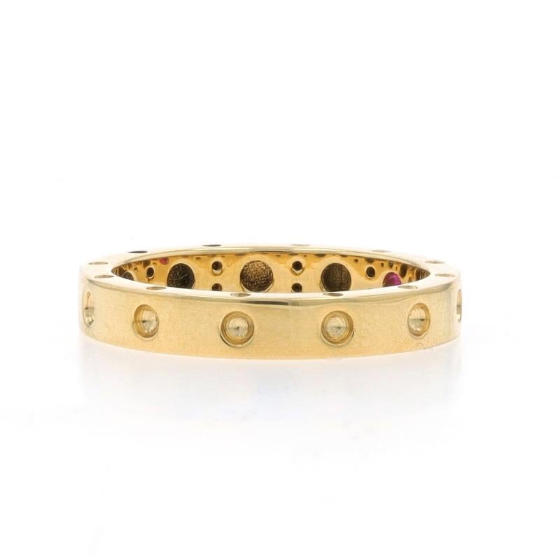 Retail Price: $940

Size: 6 1/2

Brand: Roberto Coin
Collection: Symphony
Design:  Pois Moi

Metal Content: 18k Yellow Gold

Stone Information

Synthetic Ruby
Cut: Round
Color: Pinkish Red
Stone Note: (peek-a-boo accent)

Style: Band
Features: