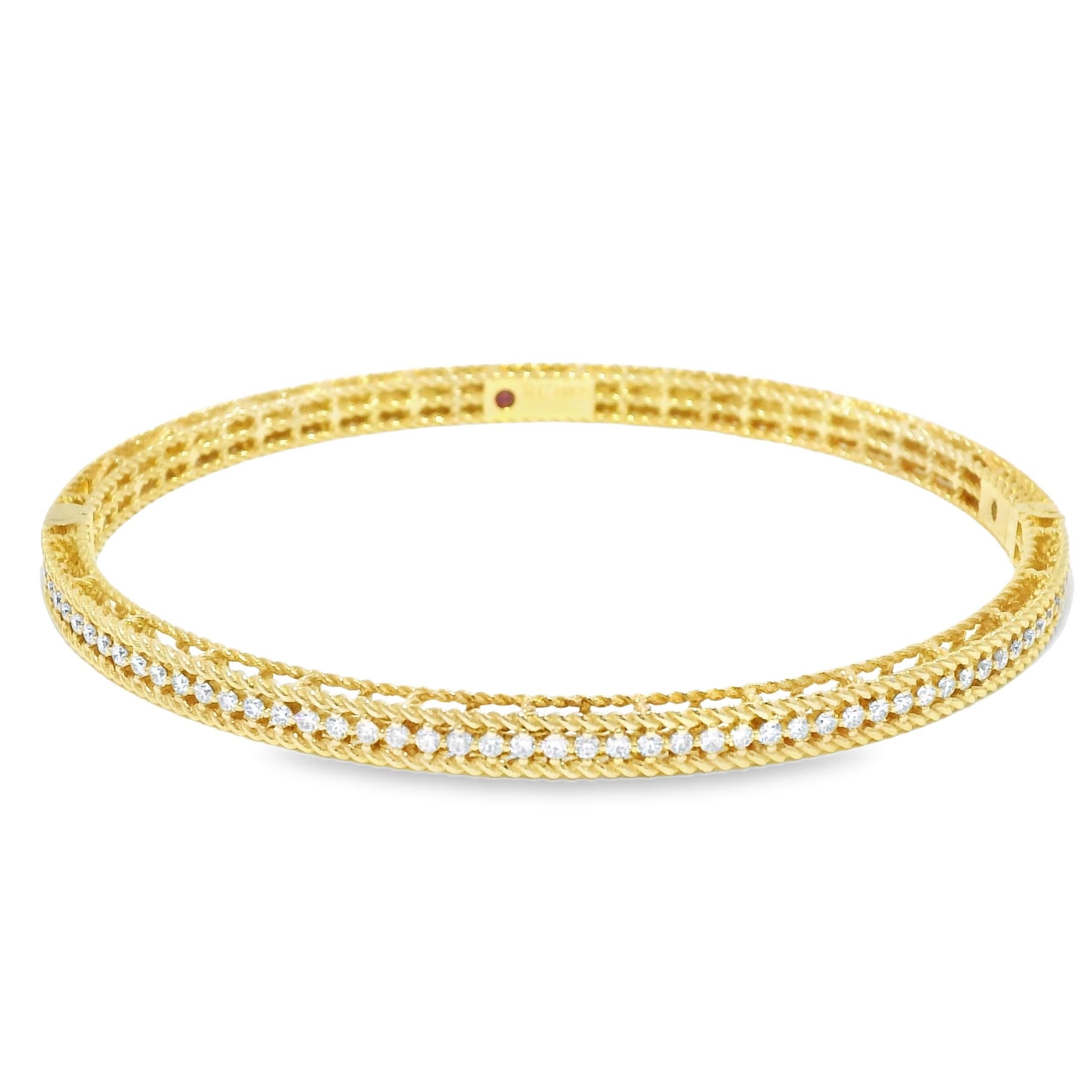 Roberto Coin 18k Yellow Gold Symphony Princess Diamond Hinged Bracelet

Crafted in 18-karat yellow gold, this bracelet features beautiful near-colorless diamonds and a hinge clasp. This is another one-of-a-kind designer piece offered by our