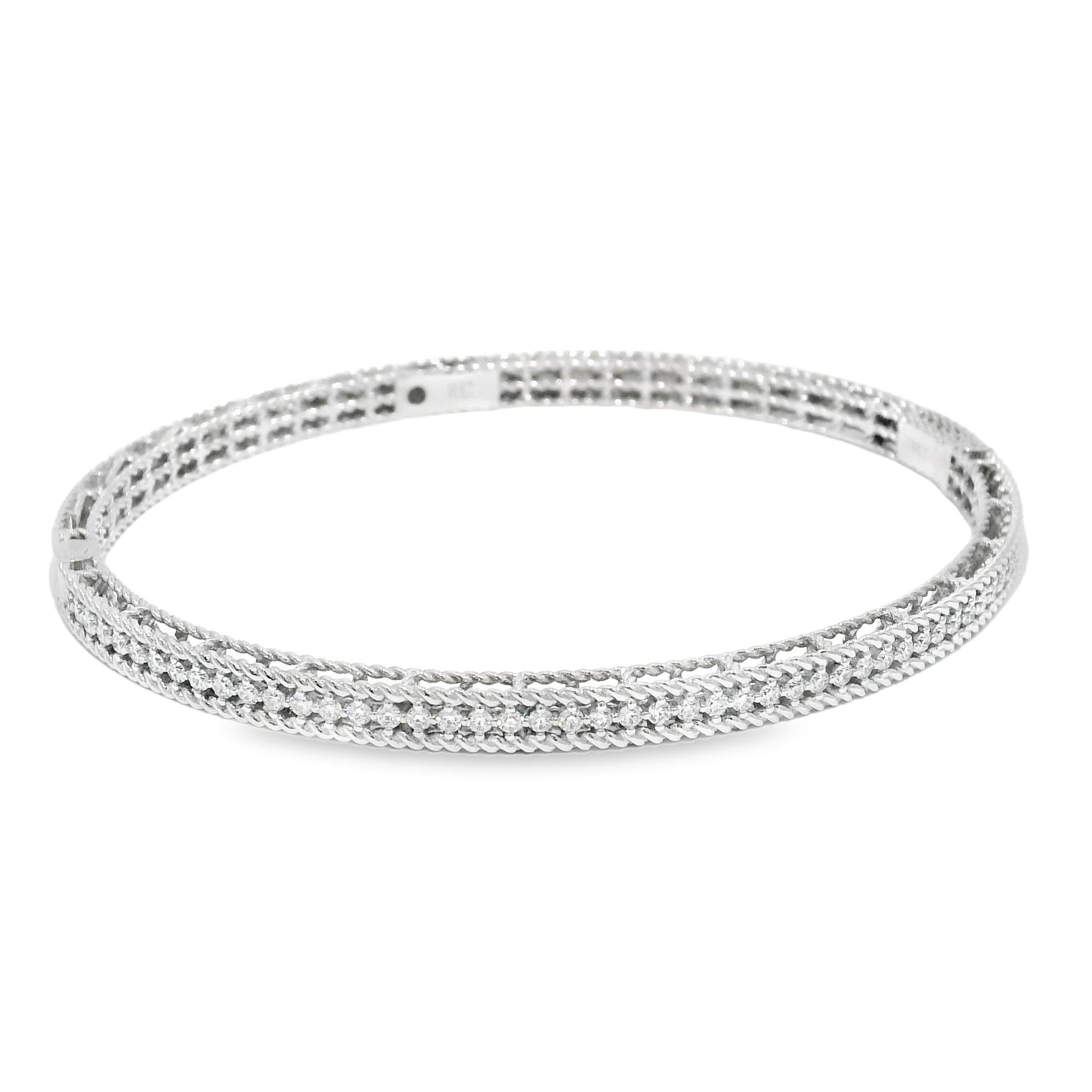Roberto Coin 18k White Gold Symphony Princess Diamond Hinged Bracelet

Crafted in 18-karat white gold, this bracelet features beautiful near-colorless diamonds and a hinge clasp. This is another one-of-a-kind designer piece offered by our location.