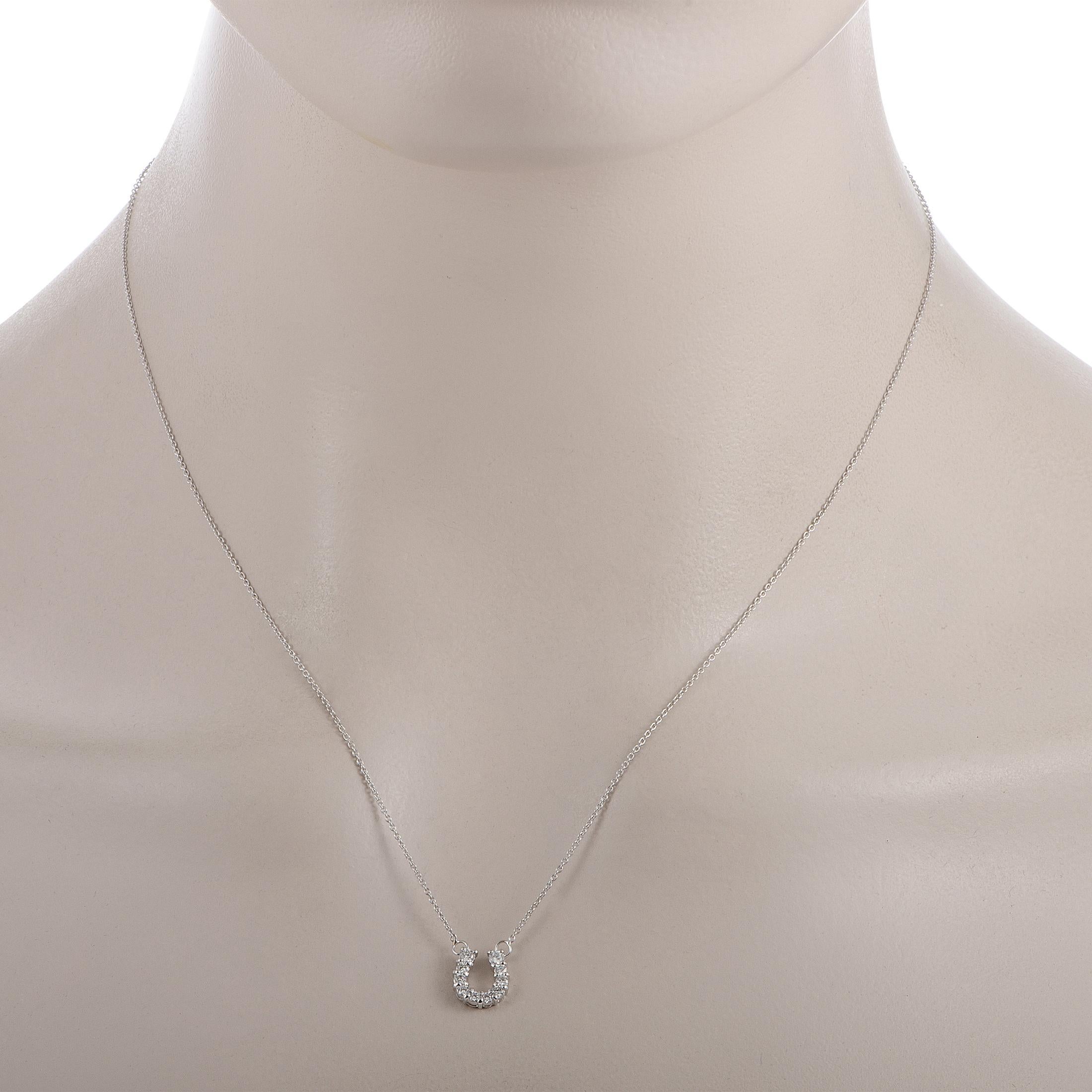 The “Tiny Treasures Horseshoe” necklace by Roberto Coin is crafted from 18K white gold and set with a total of 0.25 carats of diamonds. The necklace weighs 2.6 grams, boasting an 18” chain onto which a 0.37” by 0.25” pendant is attached.
 
