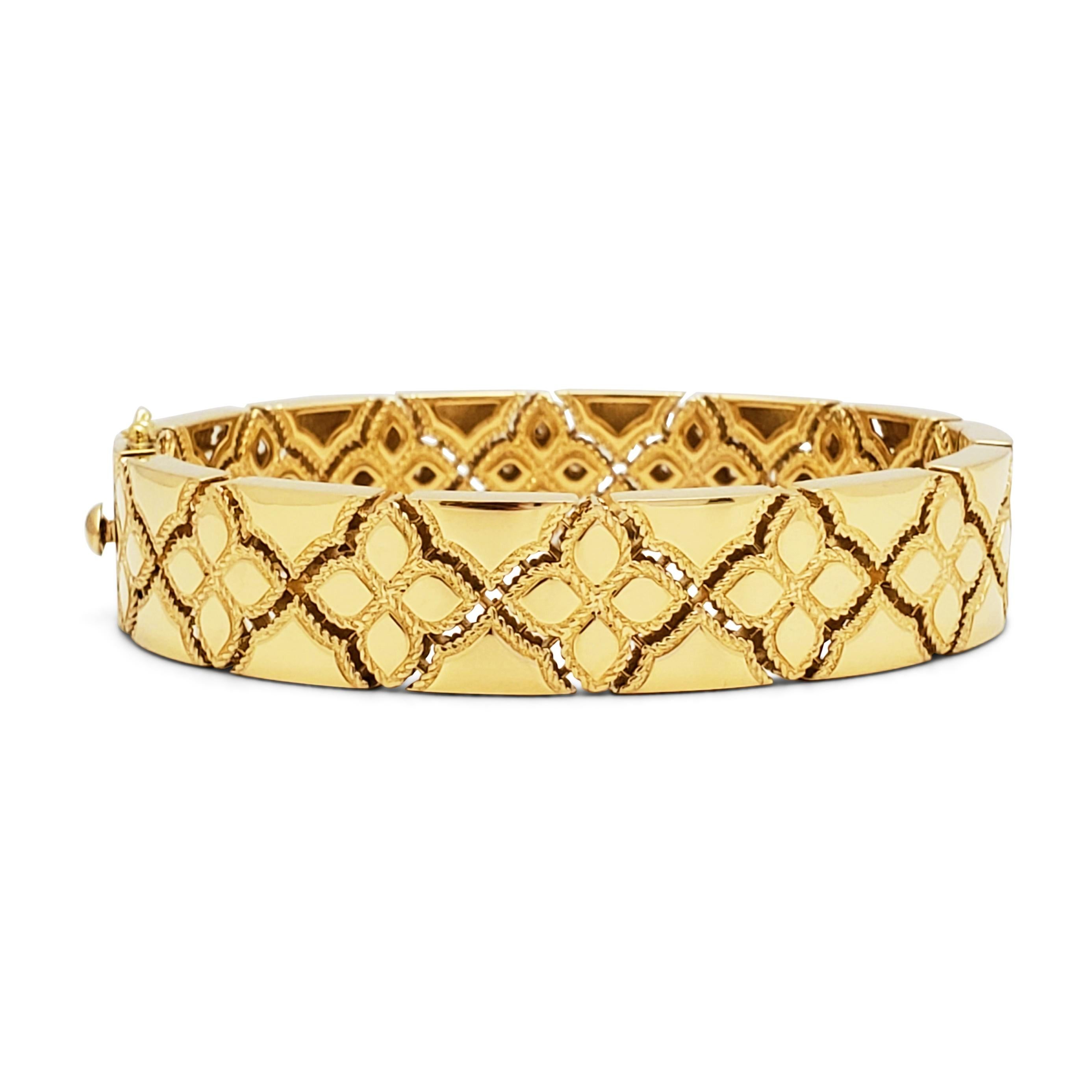 Authentic Roberto Coin bracelet from the Venetian Princess collection crafted in 18 karat yellow gold.  Featuring floral-inspired cutouts accented on one half of the bracelet with round brilliant cut diamonds for an estimated .30 carats total