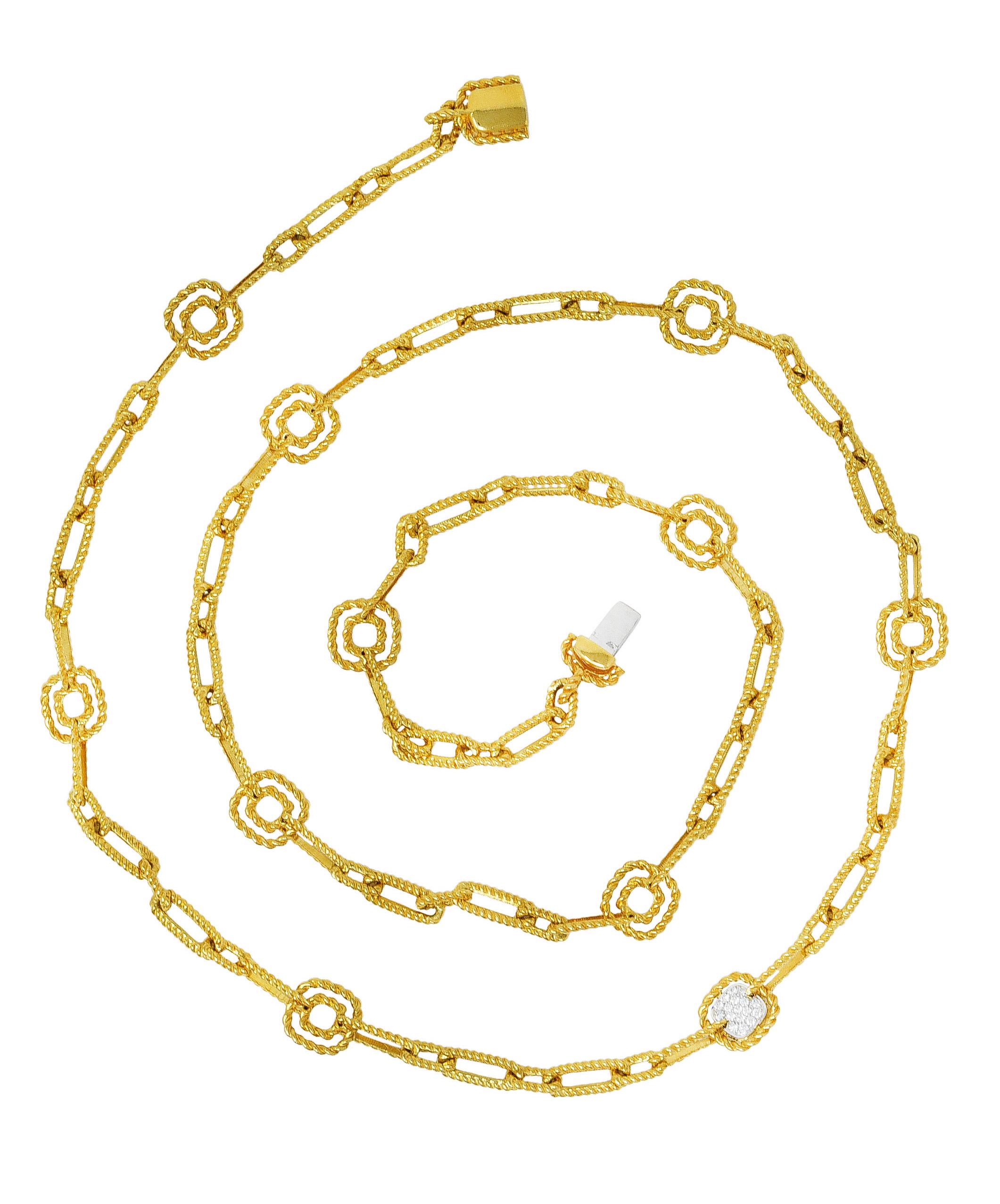 Necklace is designed as a stylized twisted rope chain comprised of rectangular and square links. Featuring round brilliant cut diamonds pavè set in the white gold center of a square link. Weighing approximately 0.25 carat total - eye clean and