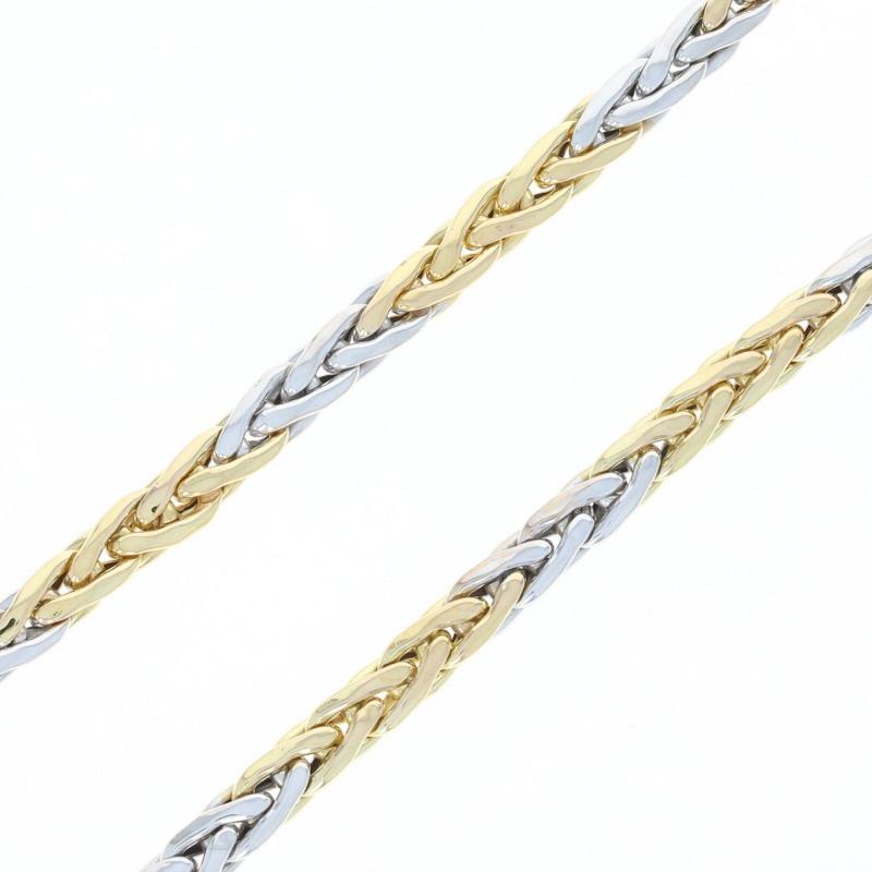 The art of fine design is truly timeless! Crafted by Roberto Coin, this luxurious wheat chain necklace is fashioned in alternating bands of 18k yellow and white gold which gives this piece a beautiful visual contrast and movement. The lobster claw