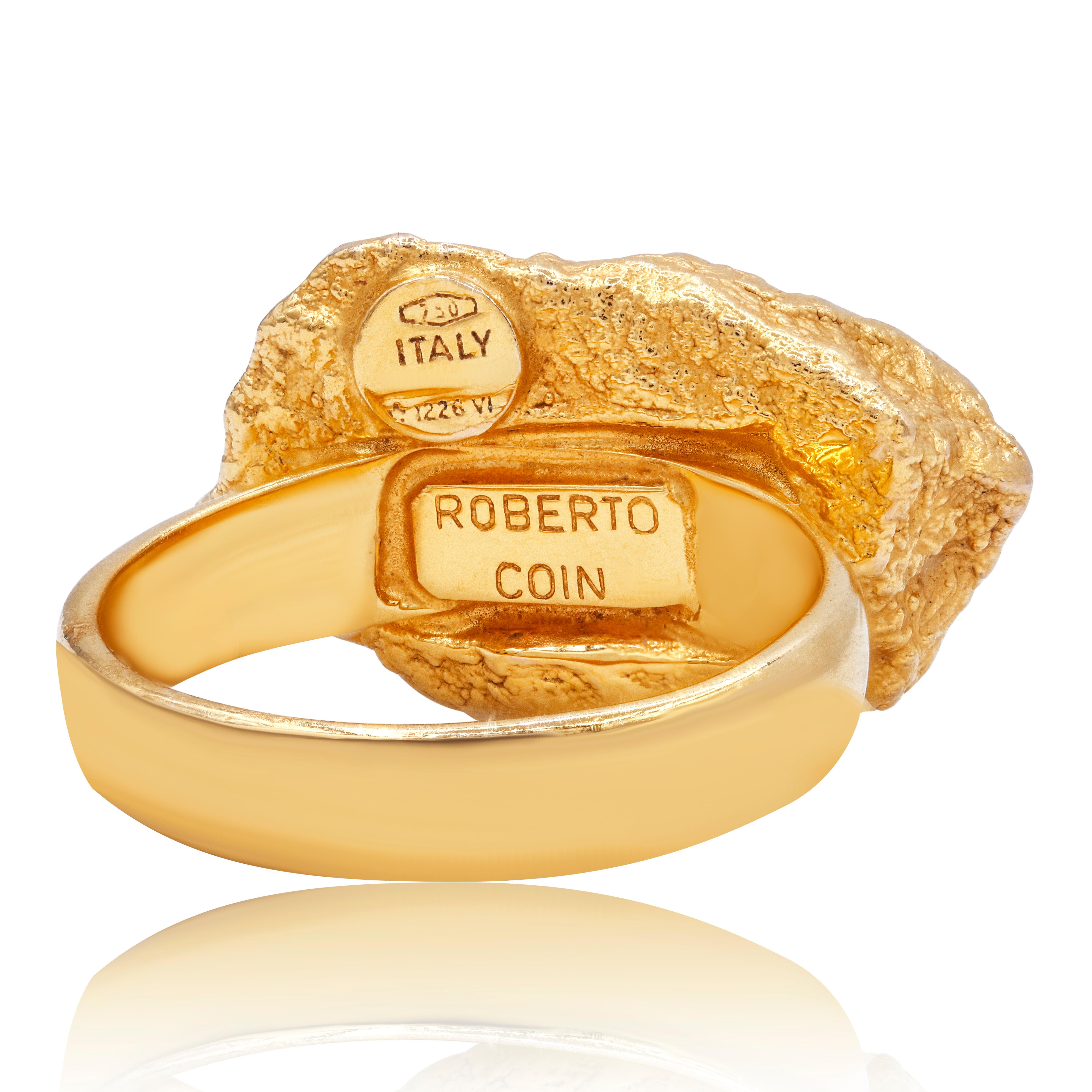 This authentic ring is by Roberto Coin from the NUGGET collection. 
Crafted from 18k yellow gold it features a hallow nugget at the top of the 4.5mm wide band. It is signed by the designer with the metal content.

Warranty
Limited lifetime