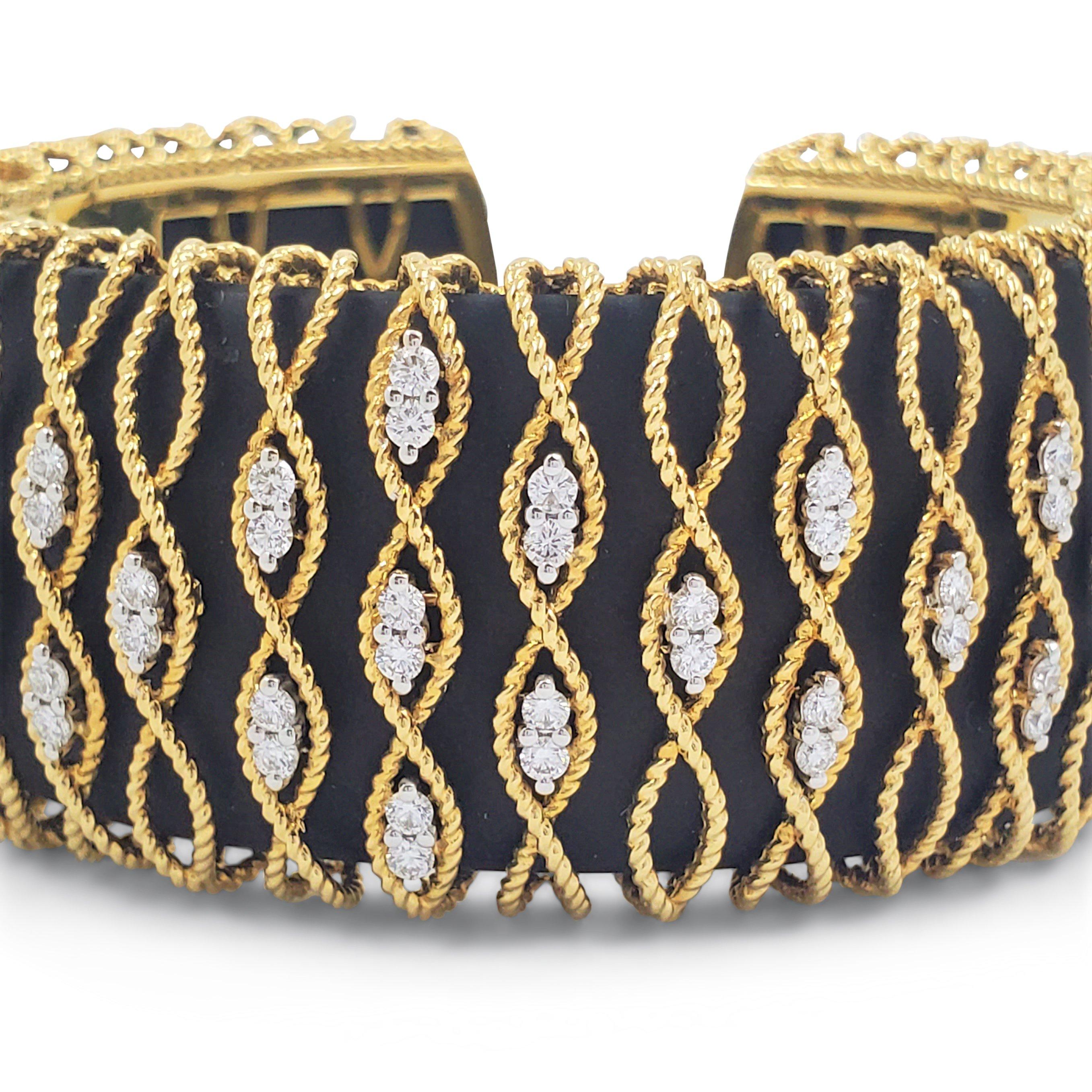 Authentic Roberto Coin cuff bracelet composed of dark wood delicately enclosed in a mesh of 18 karat yellow gold strings. 46 beautiful sparkling round brilliant cut diamonds (G-H color, S-I clarity) weighing an estimated .90 carats enhance the set