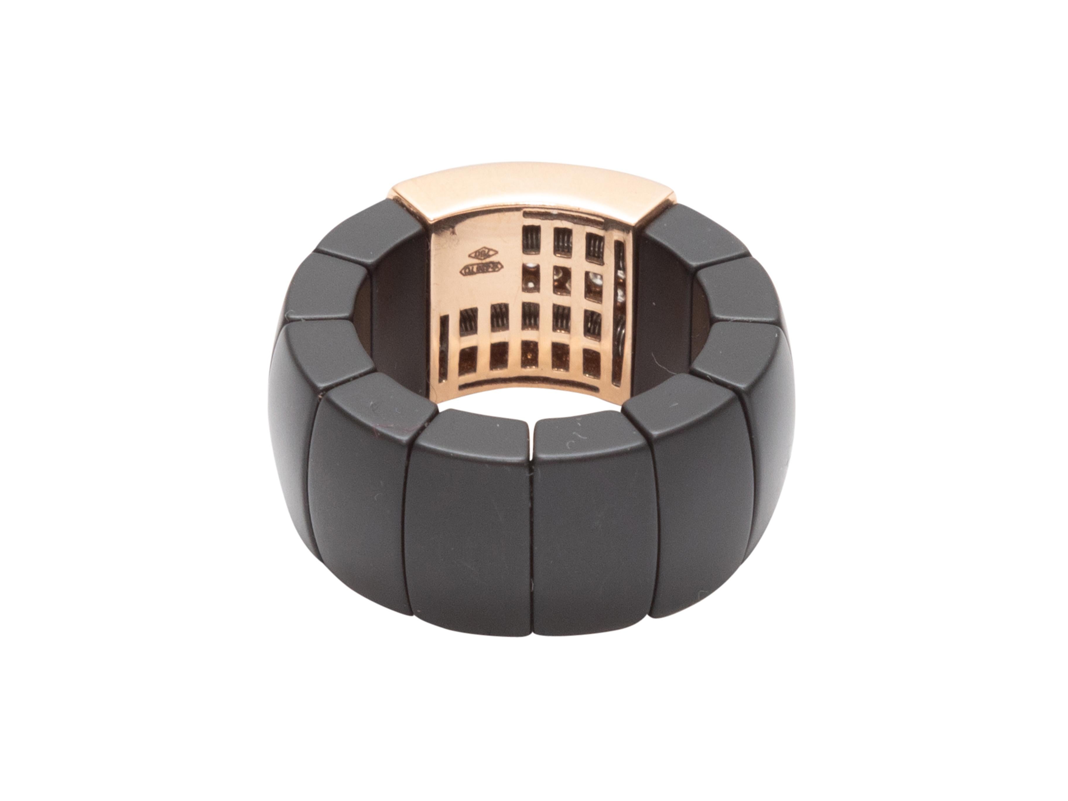 Product Details: Black and gold ceramic pave diamond ring by Roberto Demeglio. Designer size 7.

Condition: Pre-owned. Very good.

Please note this is a pre-owned item that may display signs of wear consistent with the condition listed above and