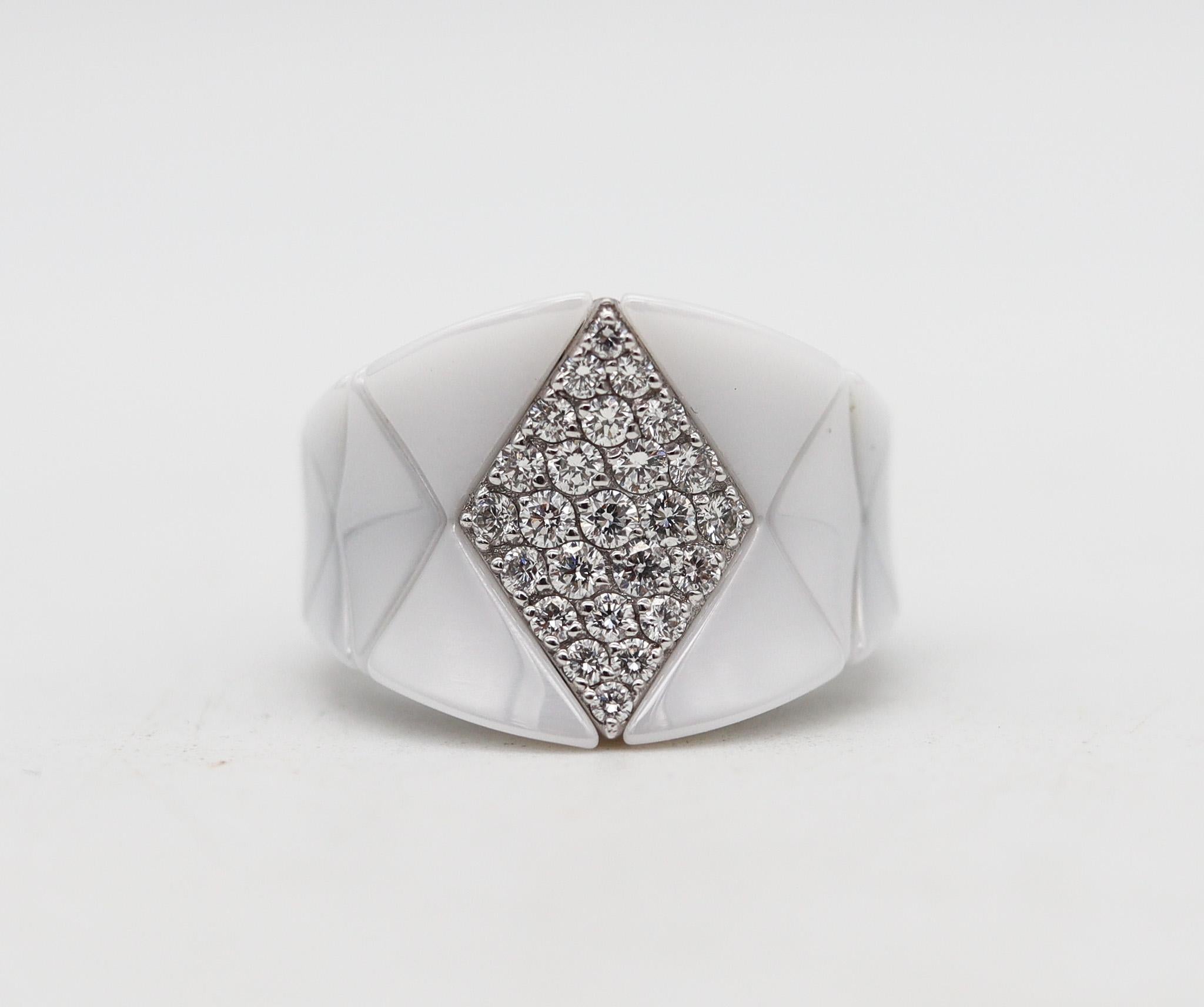 Ceramic cocktail ring designed by Roberto Demeglio.

Beautiful ultra modernist ring, created in Turin Italy by the artist jeweler Roberto Demeglio. This cocktail ring has been crafted in white crystalline ceramic with attachments made in solid white