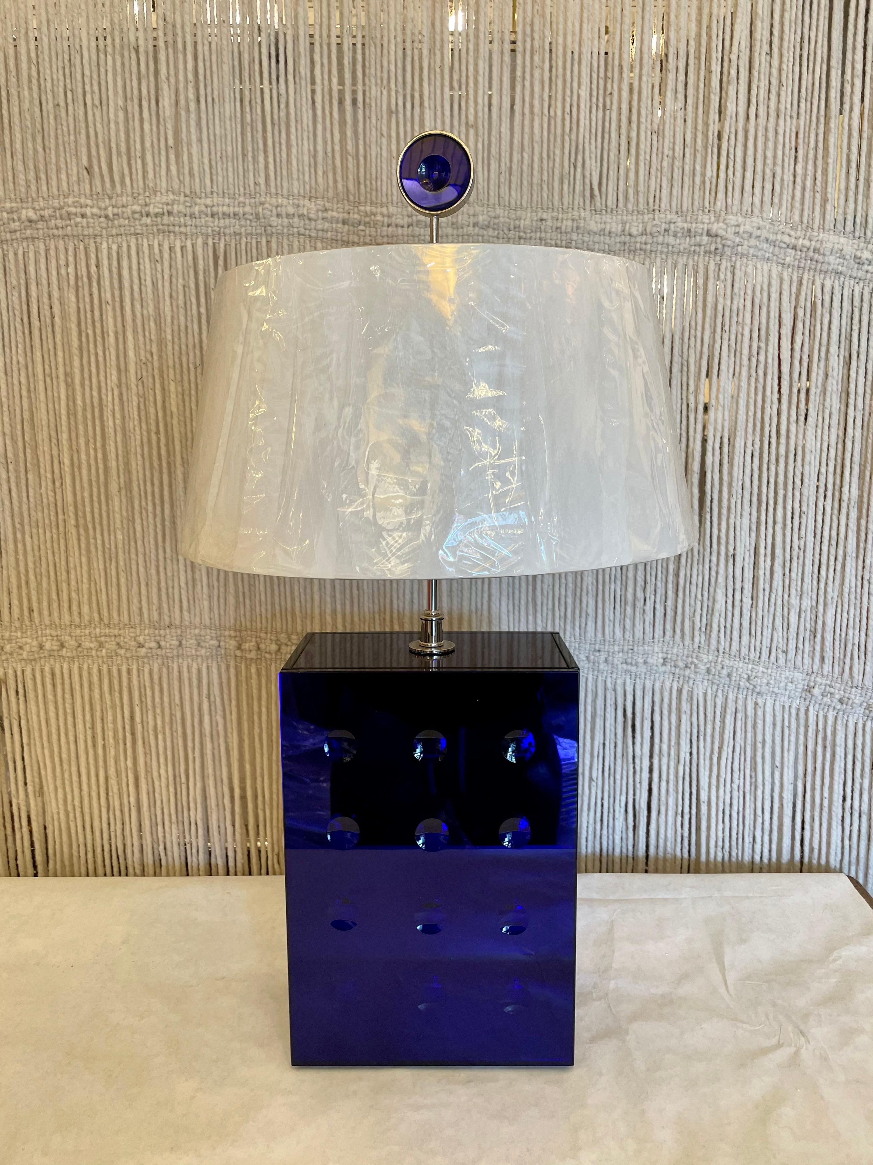 Roberto Rida made for Lorin Marsh. Metal stamped on bottom, Italy, 2000s. Contemporary glass lamp base. Cut cobalt glass with nickeled brass hardware. With original finial. Dimensions: H 13