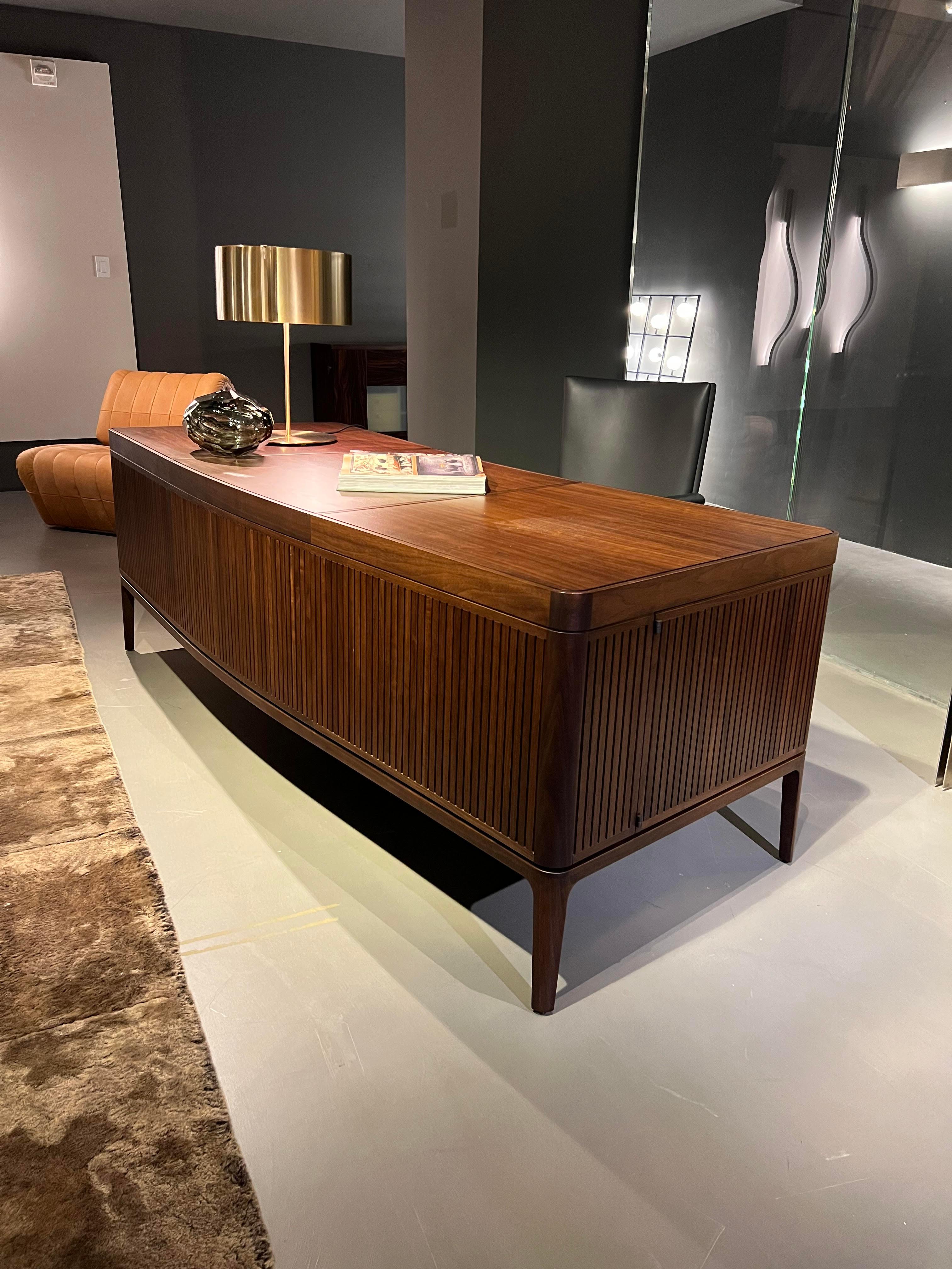 Designed by Roberto Lazzeroni in 2016, Paperweight was created for the Neverfull collection that was started with the sideboards. Executive desk and design object at the same time, it can be placed elegantly at the centre of a living room. The
