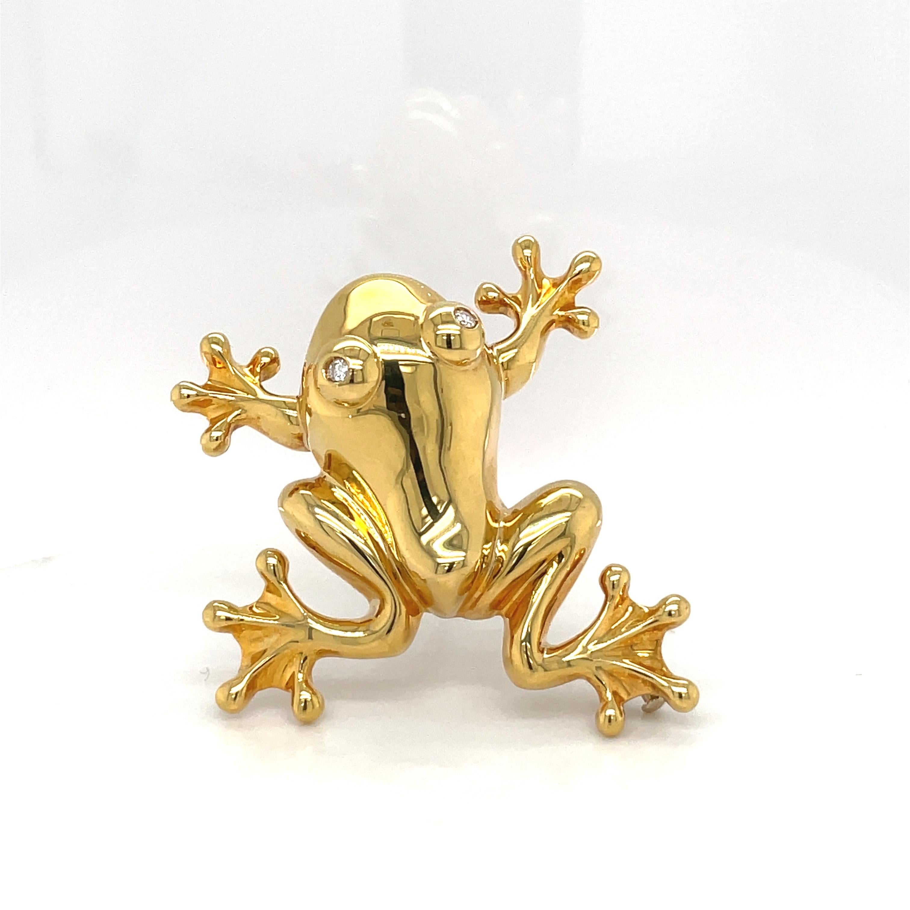 Designed in Italy by Roberto Legnazzi is a whimsical 18 karat yellow gold bullfrog brooch. The brooch is designed in a high polished yellow gold set with round brilliant diamonds for eyes. The frog measures approximately 2