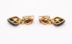 ROBERTO LEGNAZZI 1970 Orecchini pendenti in oro 18Kt con corallo e onice