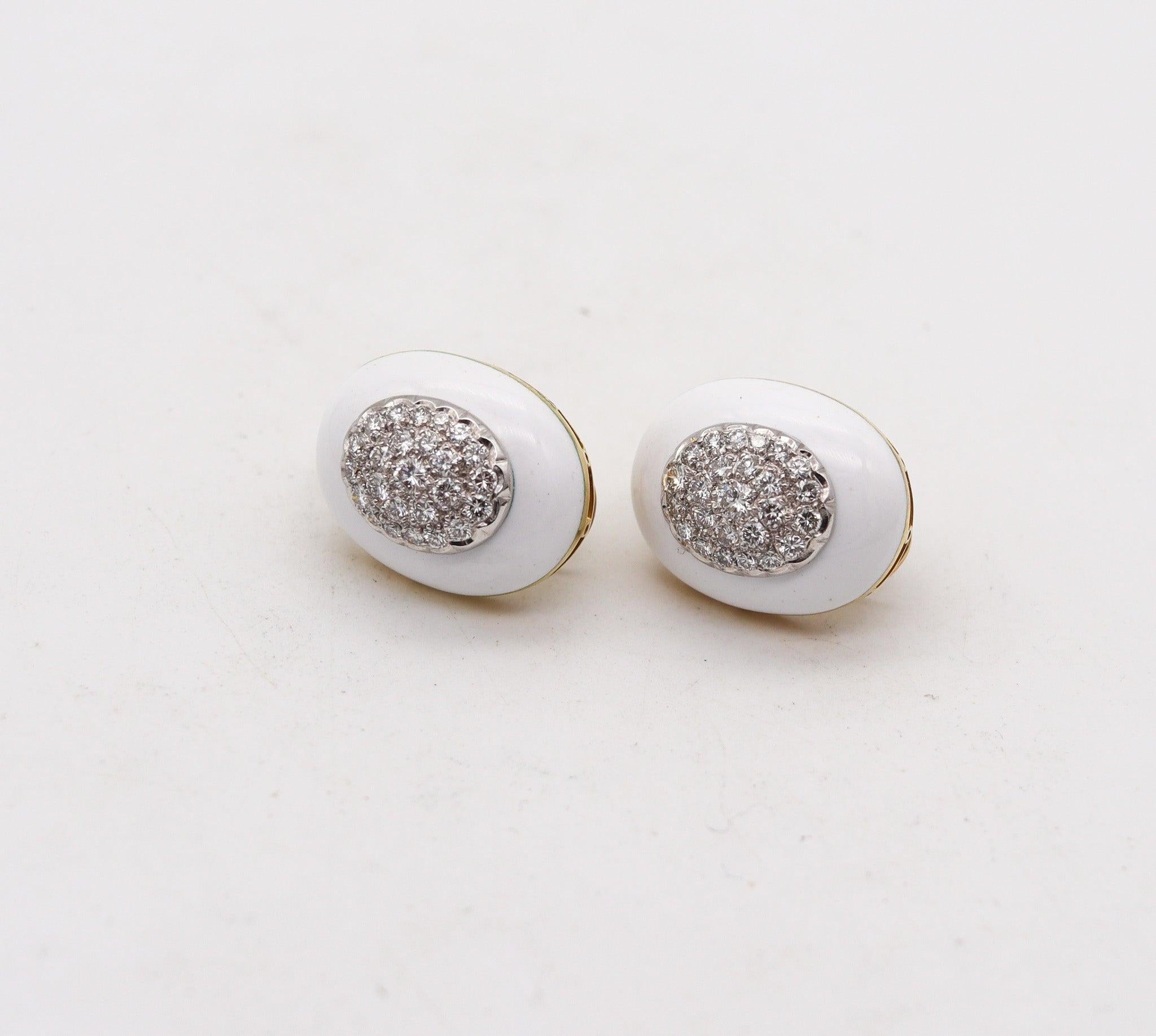 Pair of earrings designed by Roberto Legnazzi.

These are a fabulous statement pair of earrings, created in Italy at the jewelry atelier of Roberto Legnazzi, back in the 1990. The earrings has been crafted with classic patterns in an oval bombe