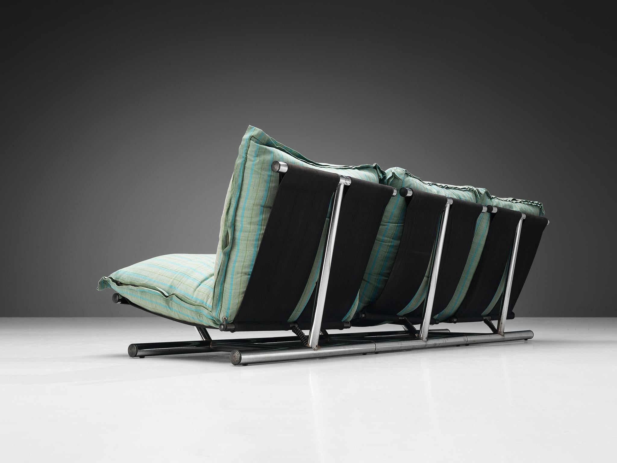 Roberto Lucci and Paolo Orlandini for Elam, sofa model 'Le Farfalle', chromed metal, coated metal, fabric, plastic, Italy, circa. 1970

The designer duo created a striking design that adds a vibrant allure to your room and intensifies the