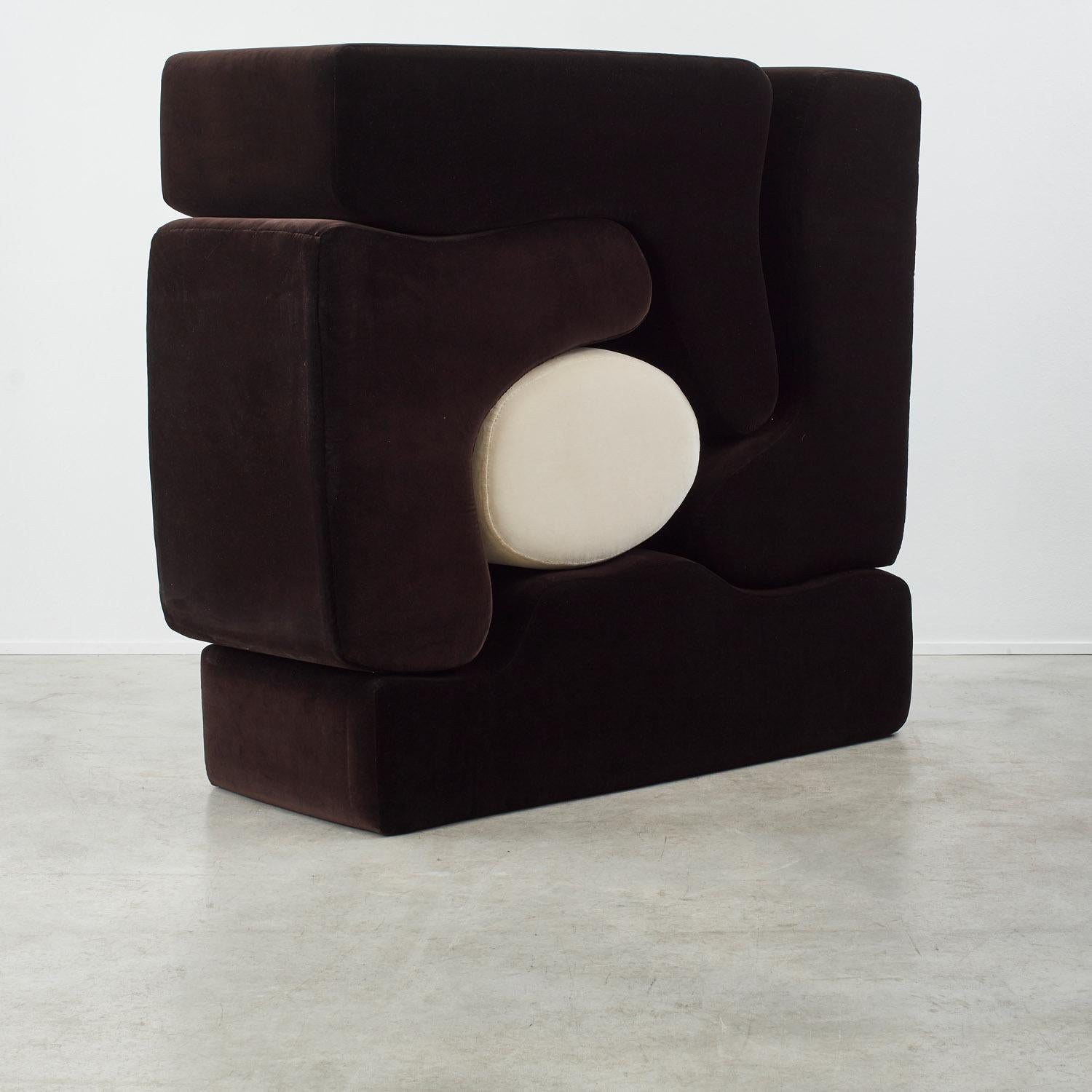 The witty and elegant Malitte is a sculptural assemblage of organic forms. When deconstructed, the interlocking elements form multi-use seating – lounge chairs, a chaise longue and a footrest. Our set has been reupholstered in an alpaca wool