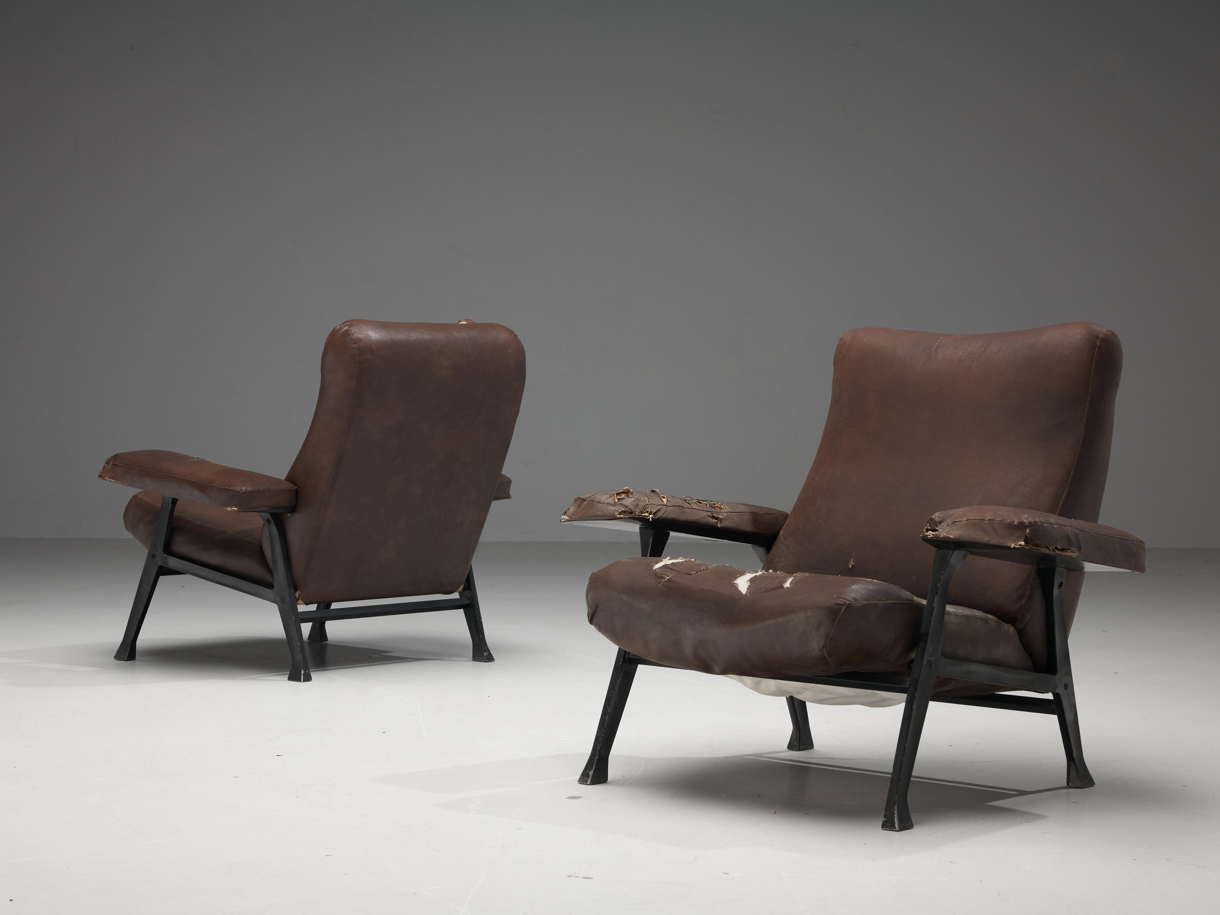 Roberto Menghi for Arflex, pair of ‘Hall’ lounge chairs, metal, faux leather, Italy, 1958

In 1958, Roberto Menghi designs an interesting series of armchairs and sofas for Arflex. The designer titled the designs as the ‘Hall’ collection. A year