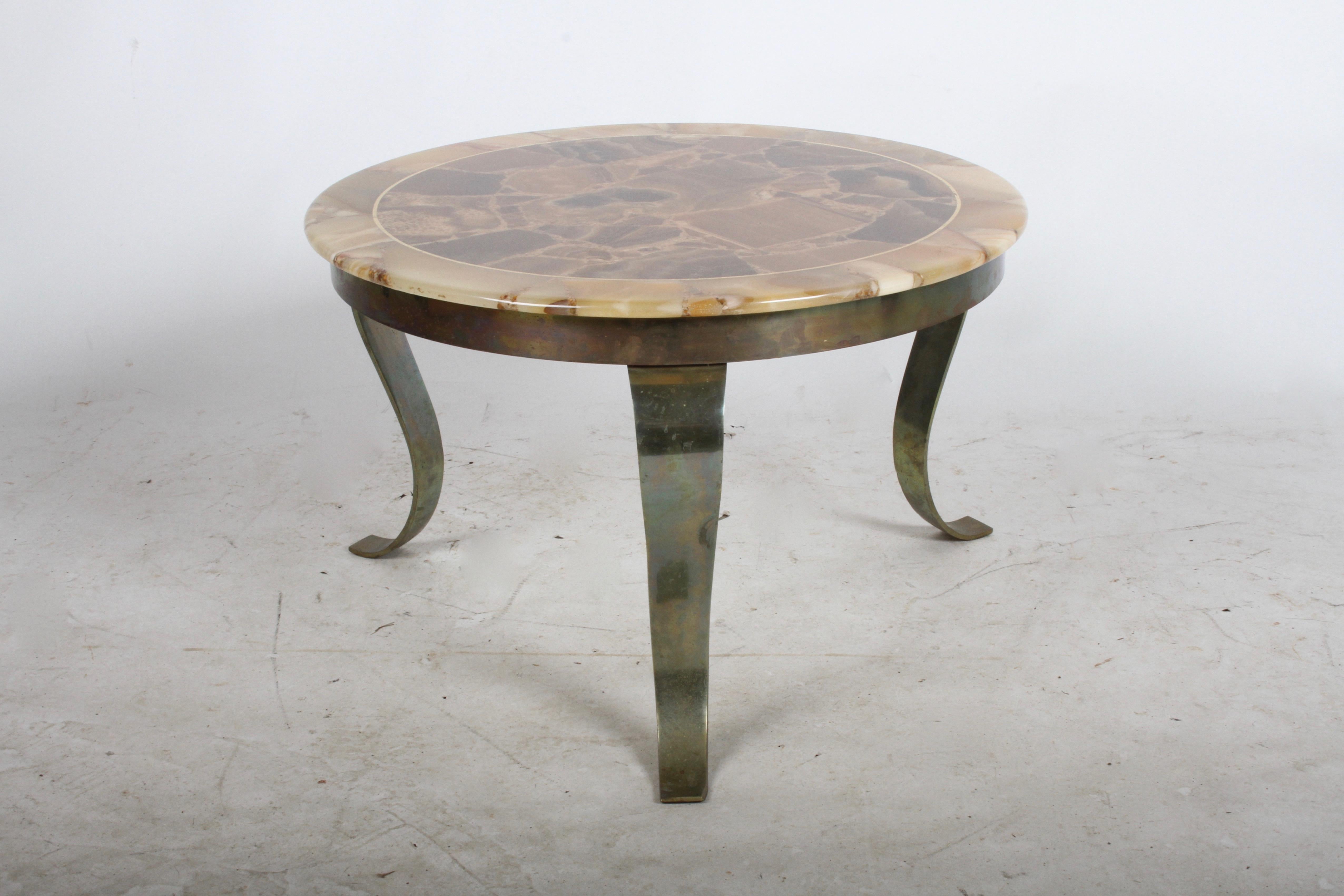 Roberto & Mito Block for Muller of Mexico round onyx and brass frame side table with scroll form legs. Darker round center with lighter onyx band, separated by a gold brass band. Table has clear coat on top. Patina to brass, no damage to the onyx.