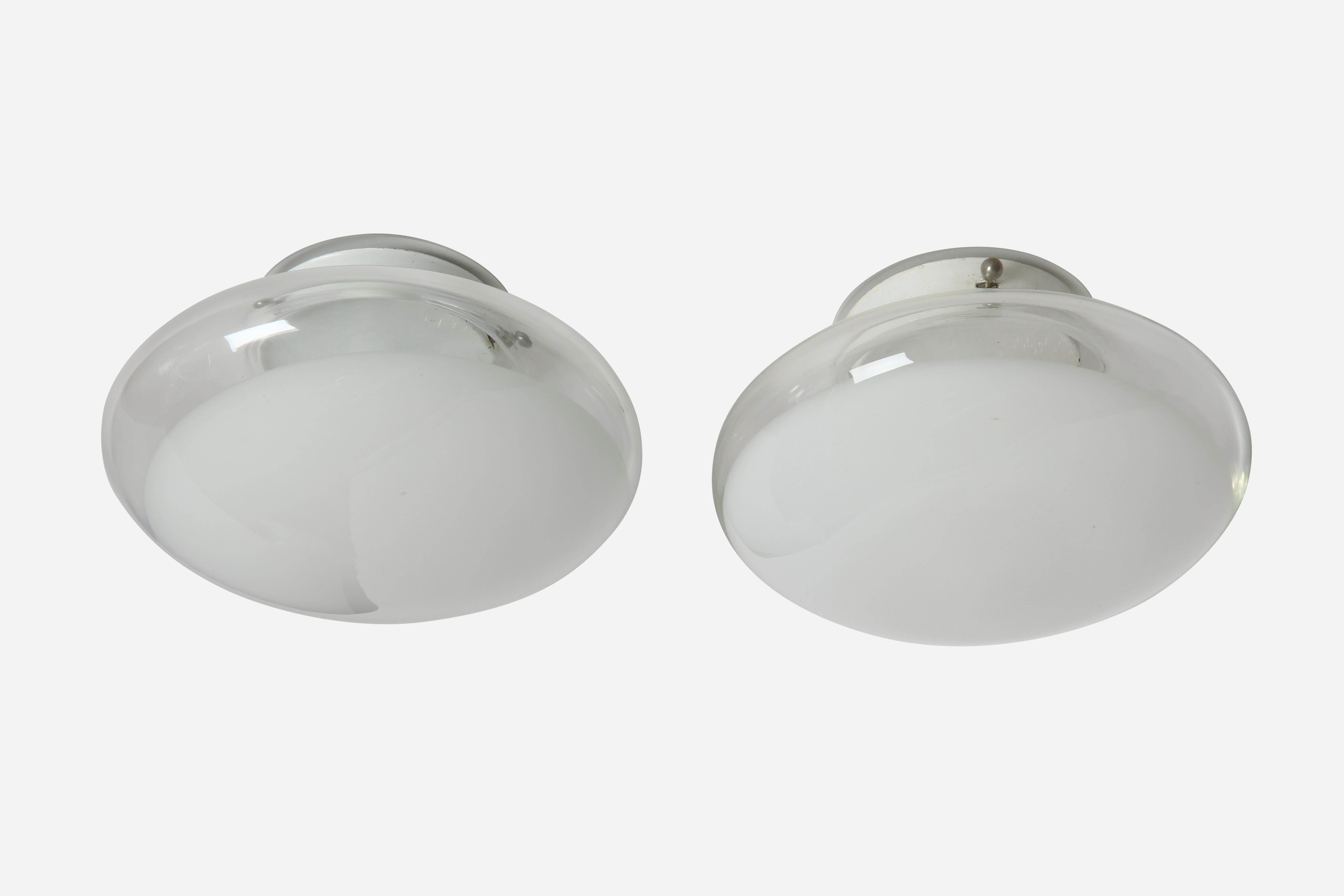 Roberto Pamio for Leucos flush mount ceiling or wall lights, a pair.
Made in Italy in 1970s
Take 1 candelabra bulb each.
Complimentary US rewiring upon request.
Price is for the pair.

We take pride in bringing vintage fixtures to their full glory