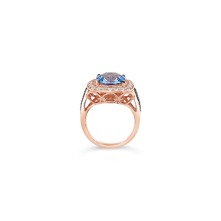 Roberto Ricci® Ring featuring 5 cts. Ocean Blue Topaz™, 5/8 cts. Vanilla Topaz™, 1/4 cts. Chocolate Quartz®, set in 14K Strawberry Gold®. Please feel free to reach out with any questions! Item comes with a suede pouch! Ring Size 7. Ring may or may