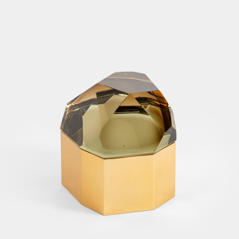 Roberto Guilio Rida exquisite amber 'Diamante Murano' glass box with thick glass ground and polished to create faceted fitted top with gilt brass base covered inside with steel, , Italy, 2017.  The glass is made of crystal glass core, then covered